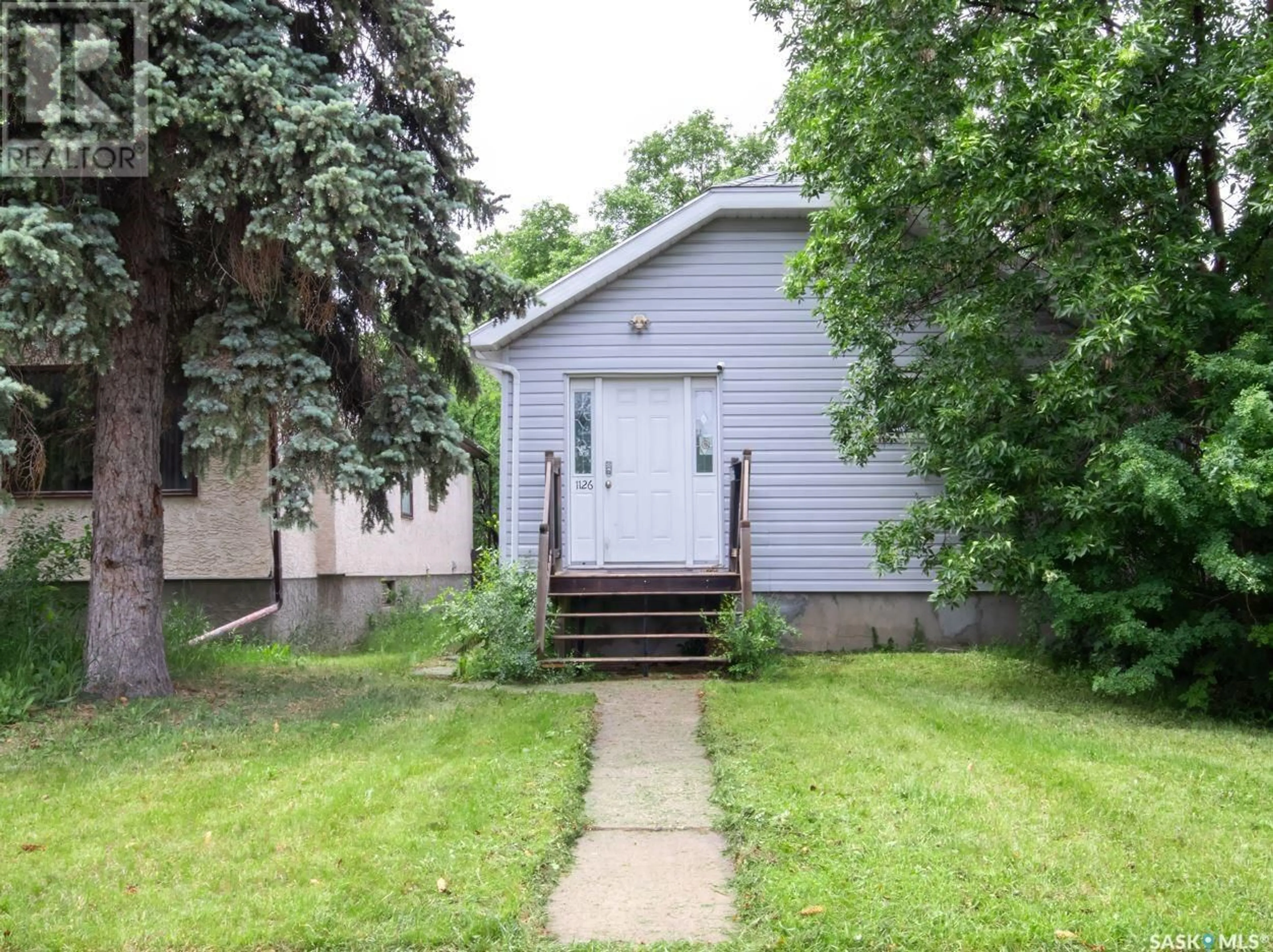 Frontside or backside of a home for 1126 Montague STREET, Regina Saskatchewan S4T3H7