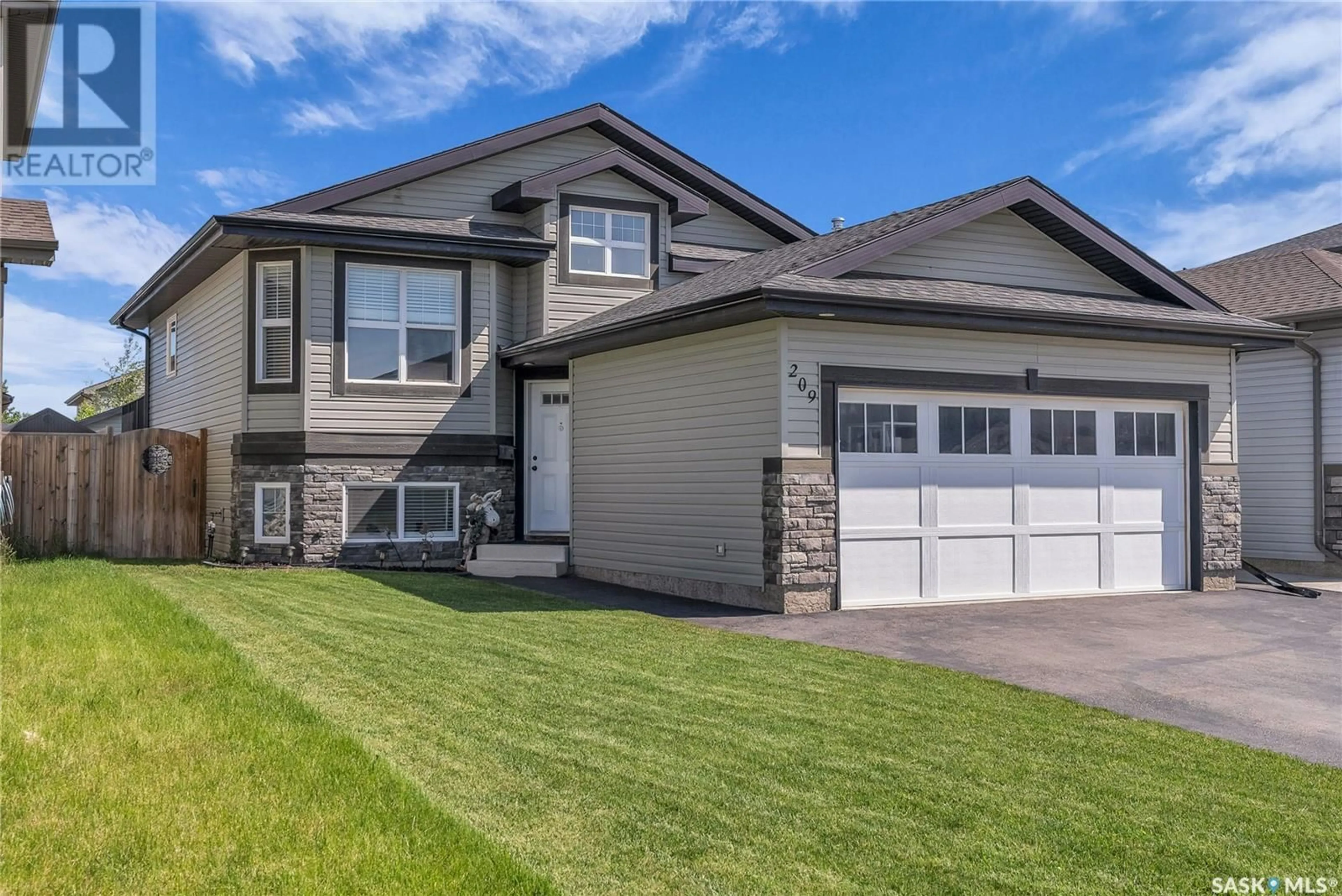 Frontside or backside of a home for 209 Stone TERRACE, Martensville Saskatchewan S0K0A2