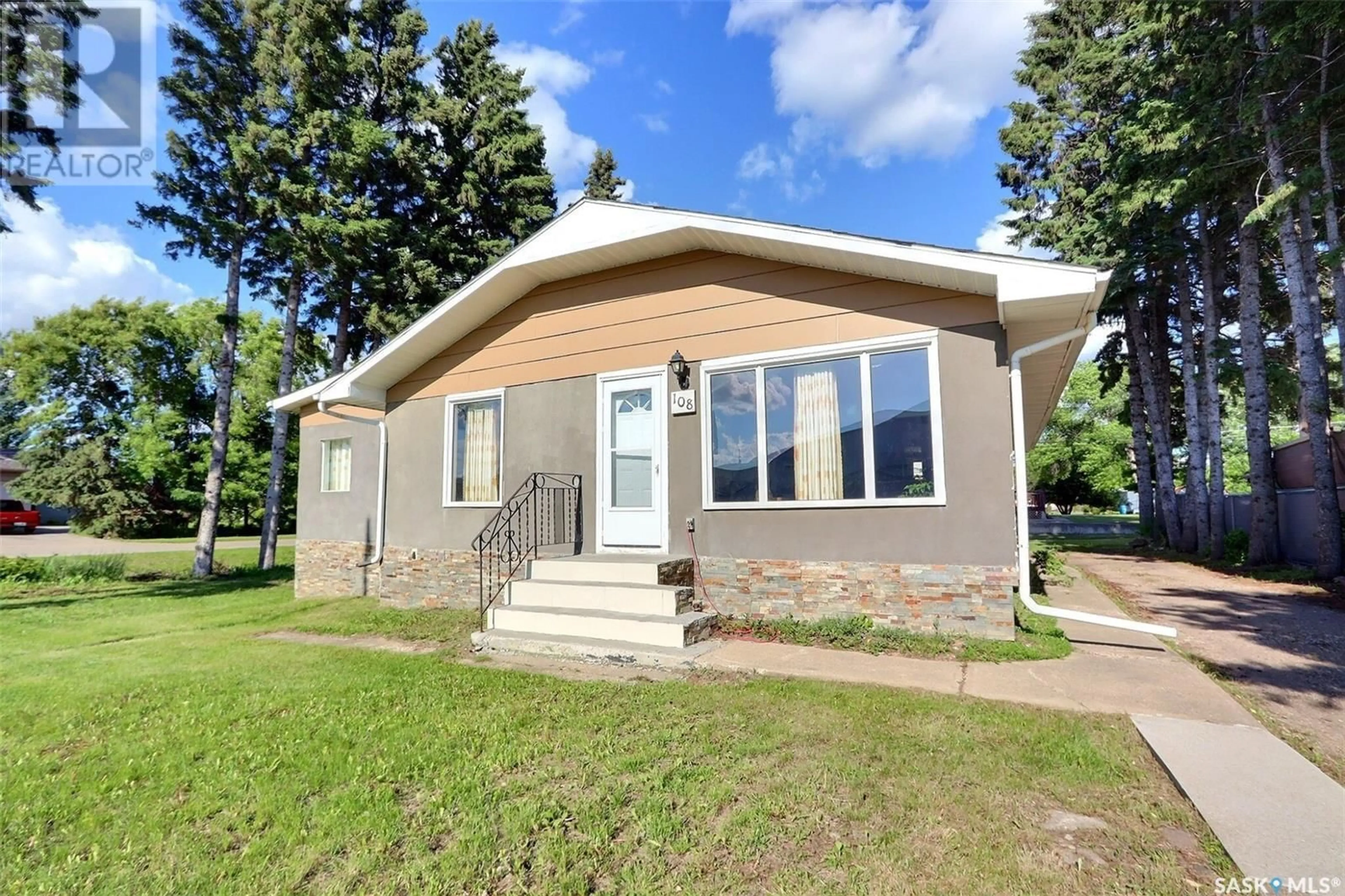 Home with vinyl exterior material, street for 108 MAIN STREET, Shellbrook Saskatchewan S0J2E0