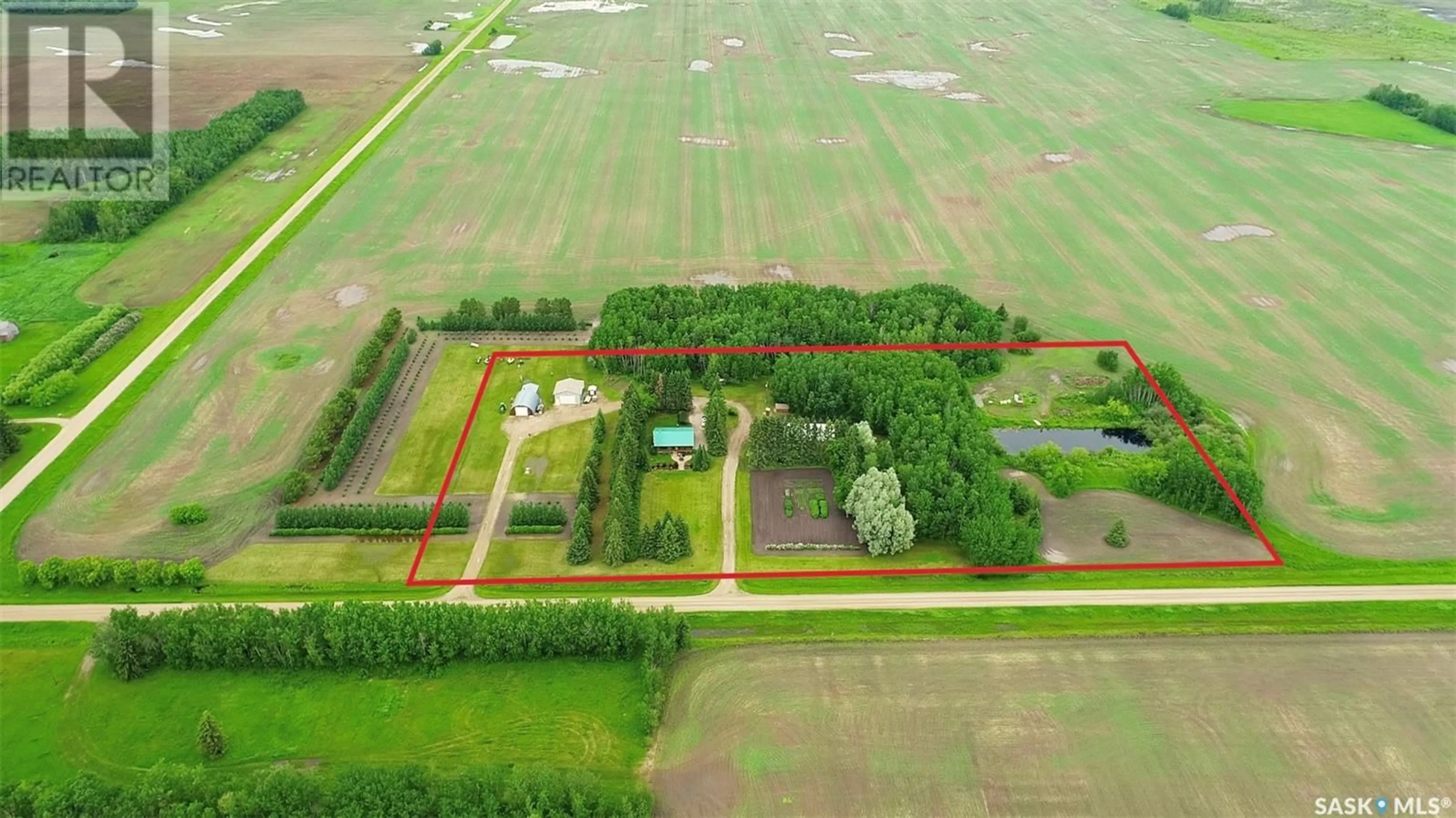 A pic from outside/outdoor area/front of a property/back of a property/a pic from drone, unknown for GARRICK LOG HOME ACREAGE, Torch River Rm No. 488 Saskatchewan S0J0Z0