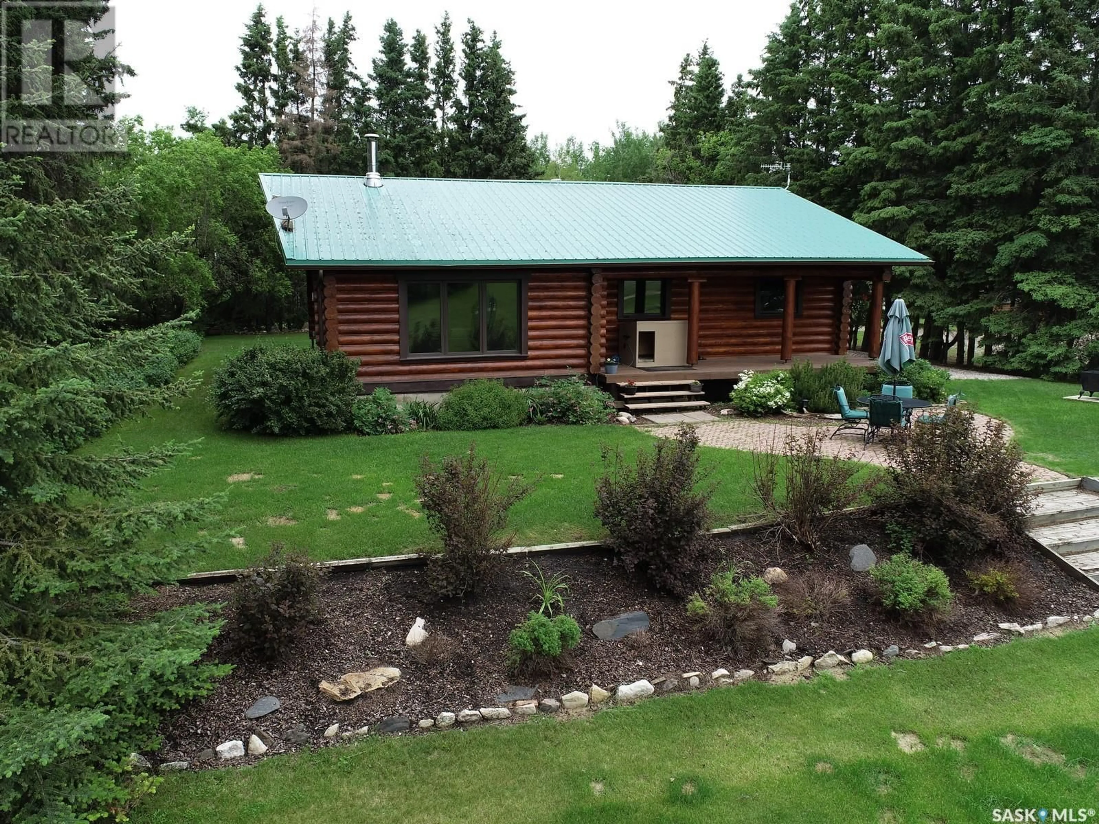 A pic from outside/outdoor area/front of a property/back of a property/a pic from drone, unknown for GARRICK LOG HOME ACREAGE, Torch River Rm No. 488 Saskatchewan S0J0Z0