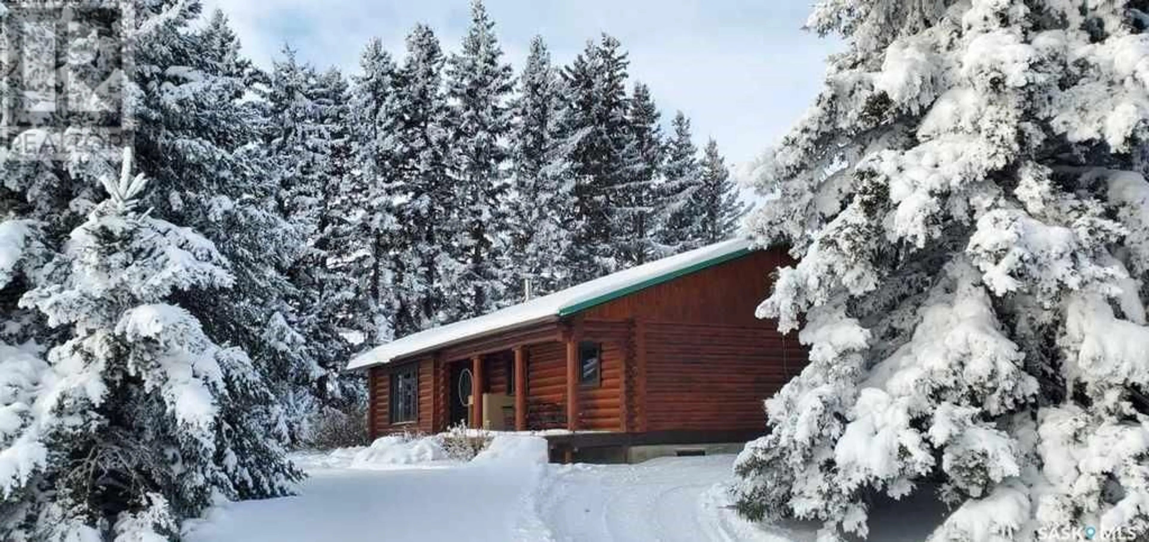 A pic from outside/outdoor area/front of a property/back of a property/a pic from drone, unknown for GARRICK LOG HOME ACREAGE, Torch River Rm No. 488 Saskatchewan S0J0Z0