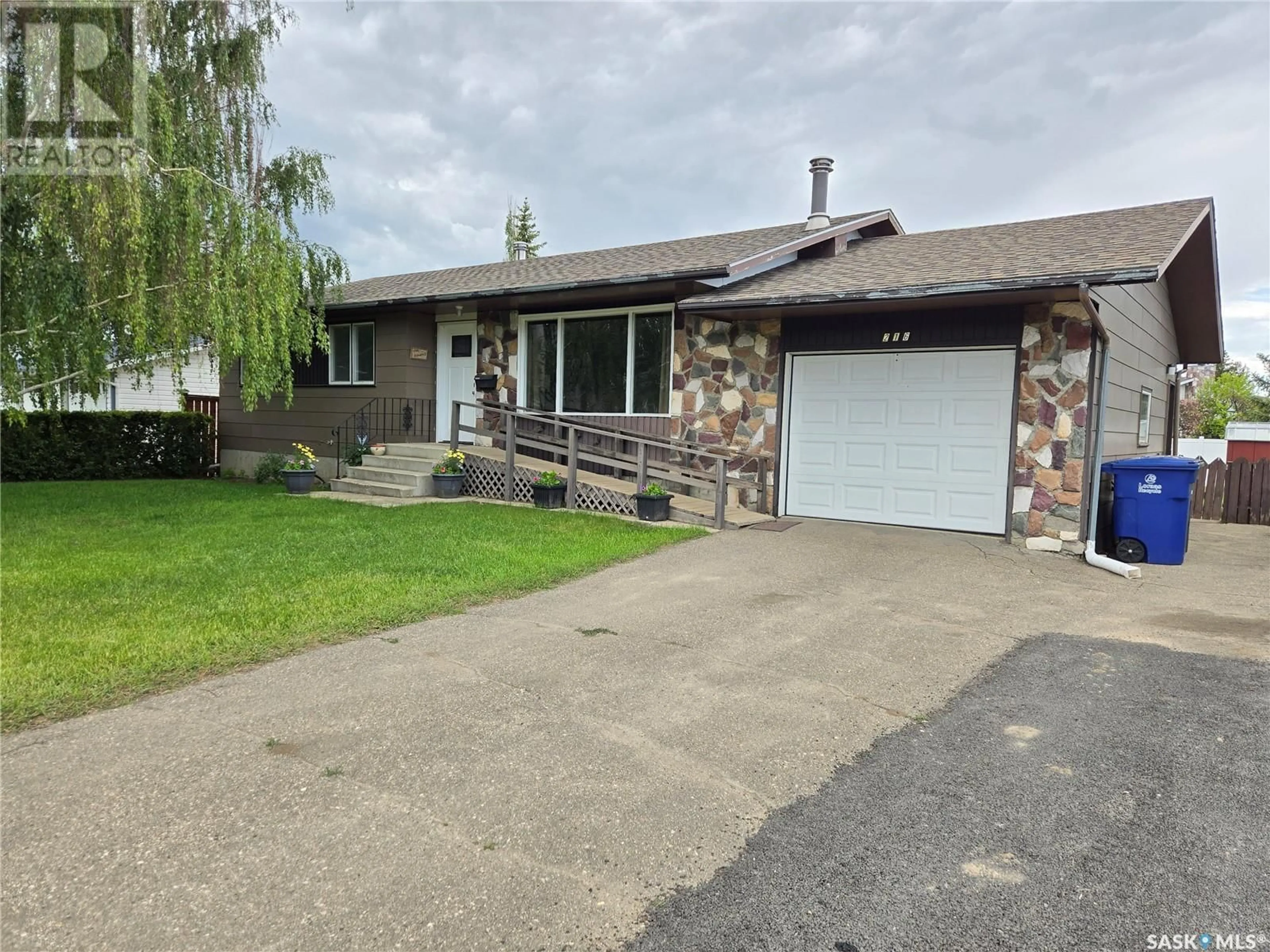 Frontside or backside of a home for 216 Cross STREET, Outlook Saskatchewan S0L2N0