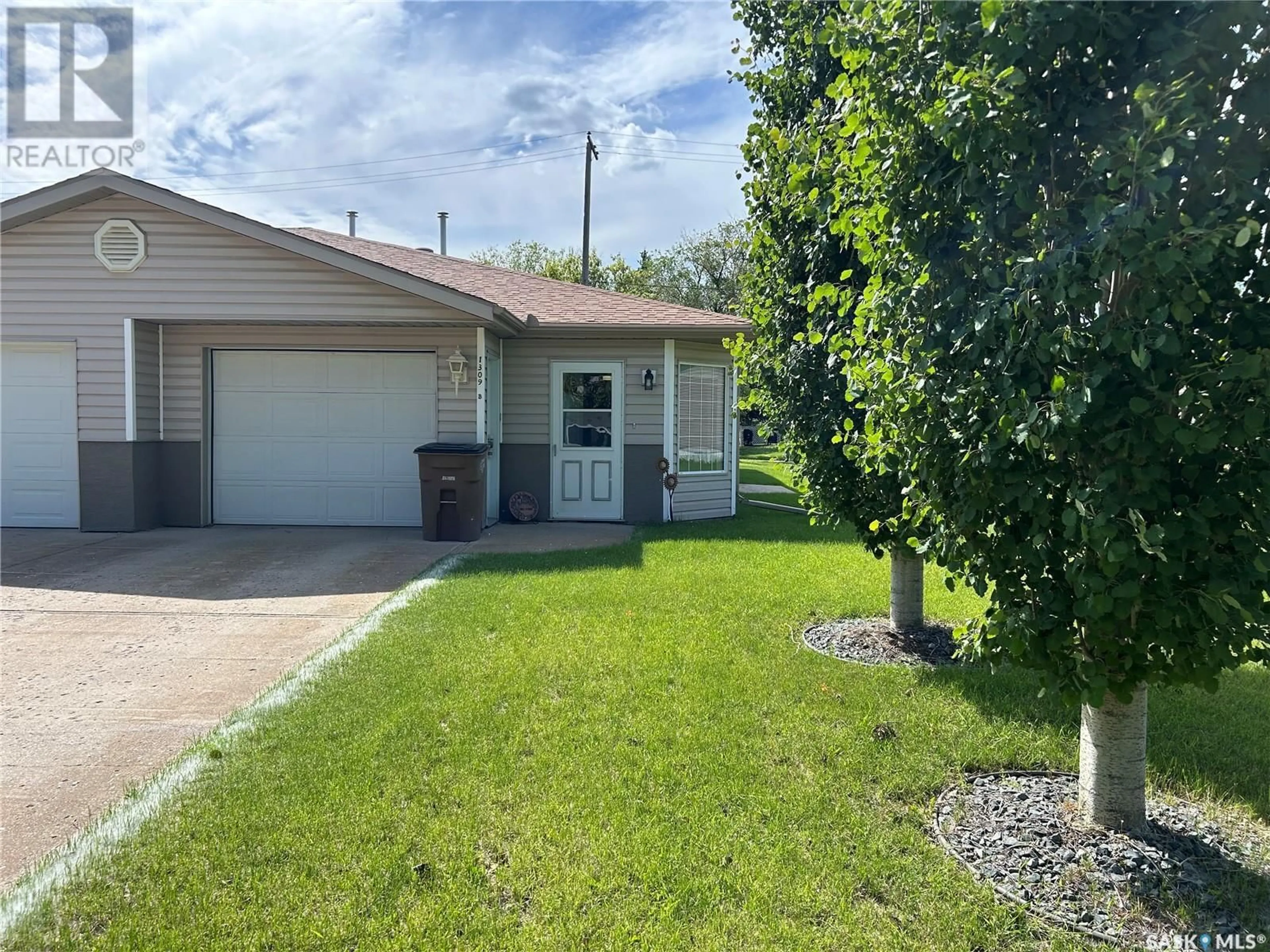 Frontside or backside of a home for B 1309 98th STREET, Tisdale Saskatchewan S0E1T0