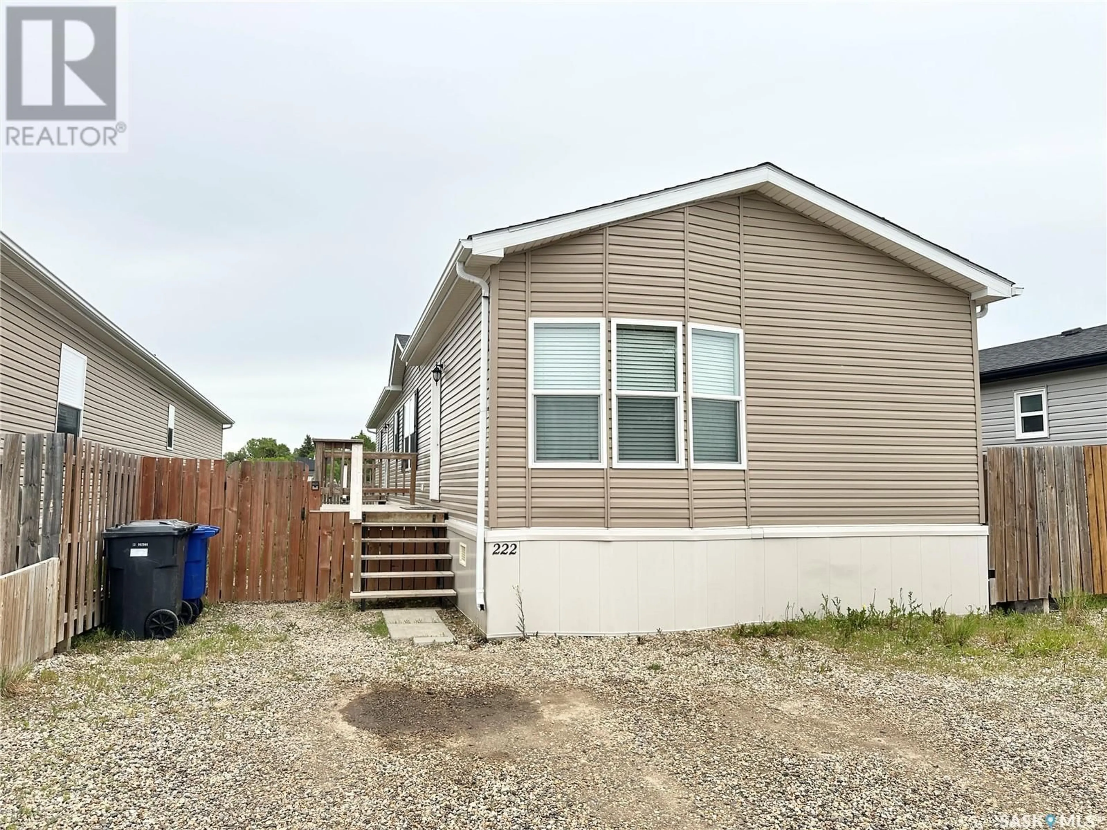 Frontside or backside of a home for 222 Brownlee STREET, Weyburn Saskatchewan S4H3P4