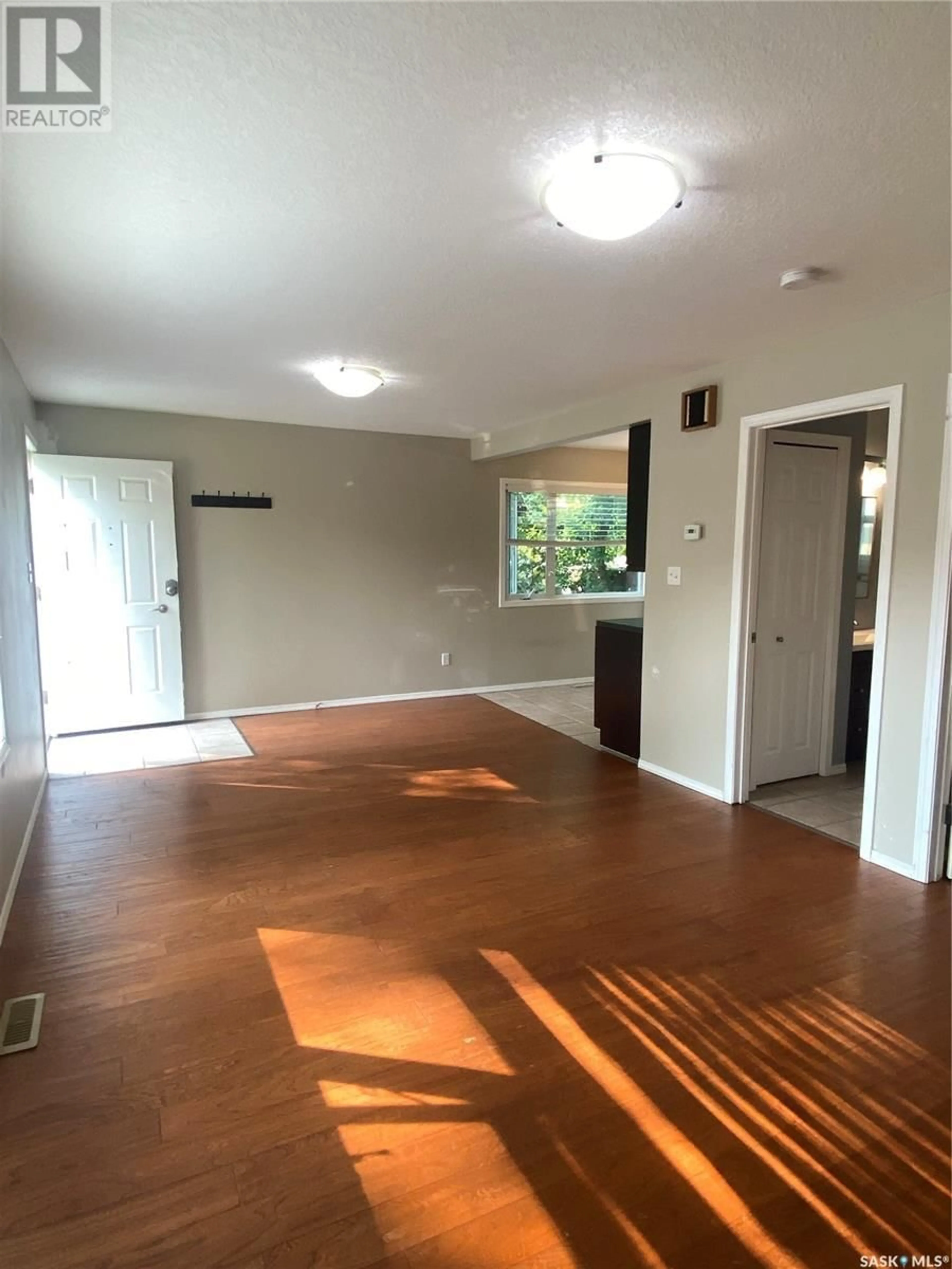 A pic of a room, wood floors for 651 101st STREET, North Battleford Saskatchewan S9A0Y7