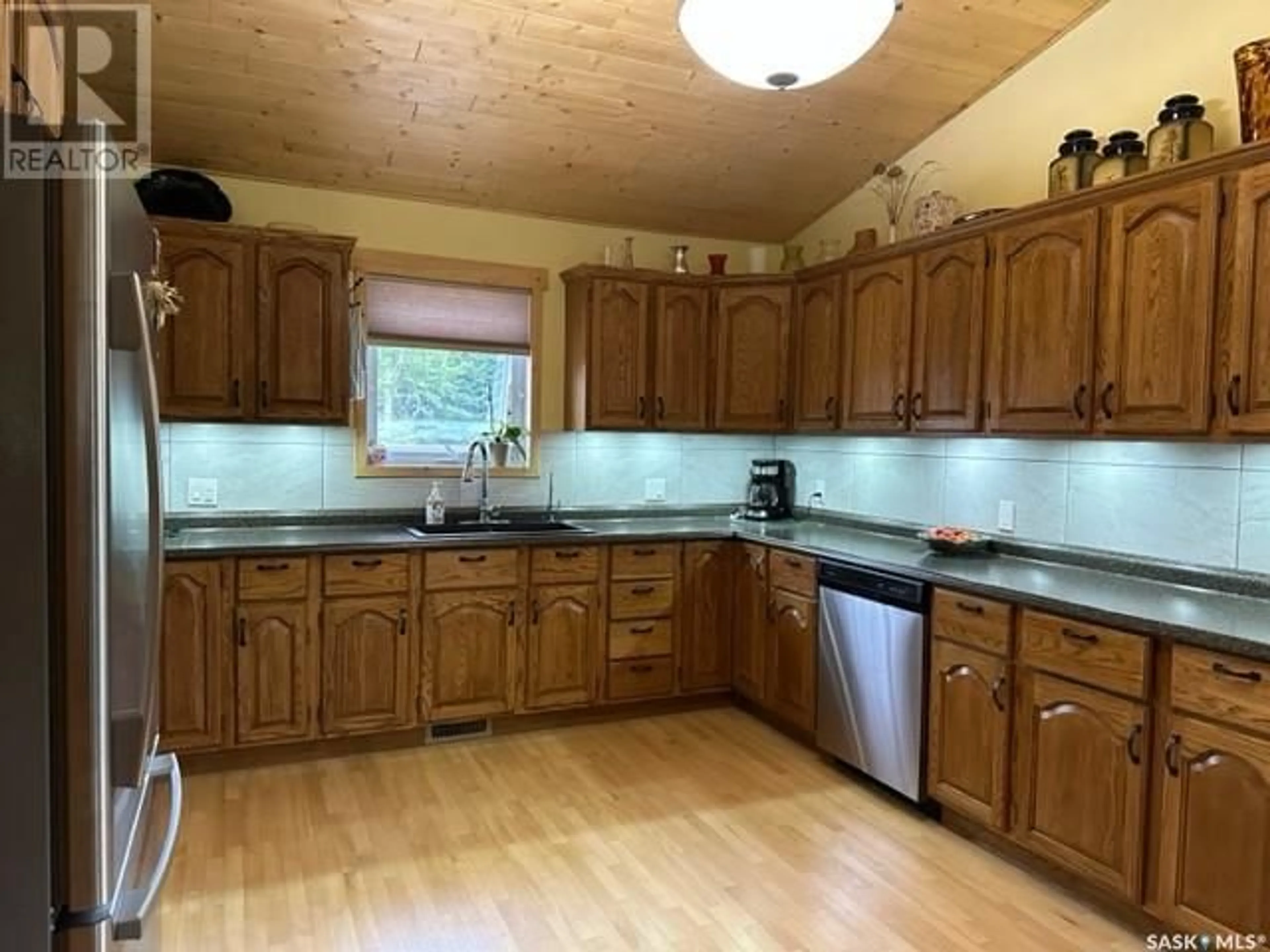 Kitchen, wood floors, cottage for 1411 Minayik CRESCENT, Lac La Ronge Saskatchewan S0J3G0