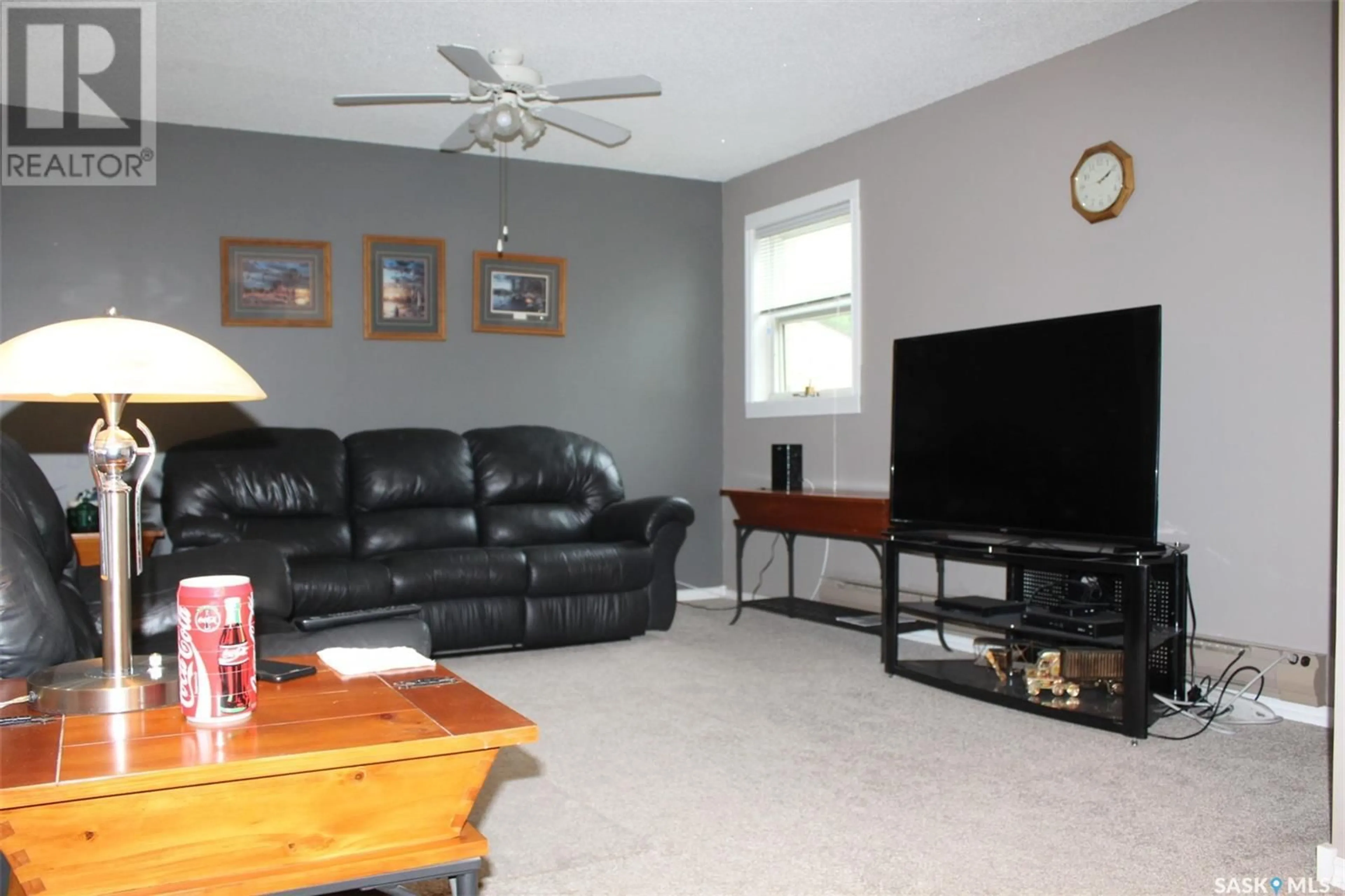 Living room, wood floors for 21 228 3rd STREET, Weyburn Saskatchewan S4H0W6