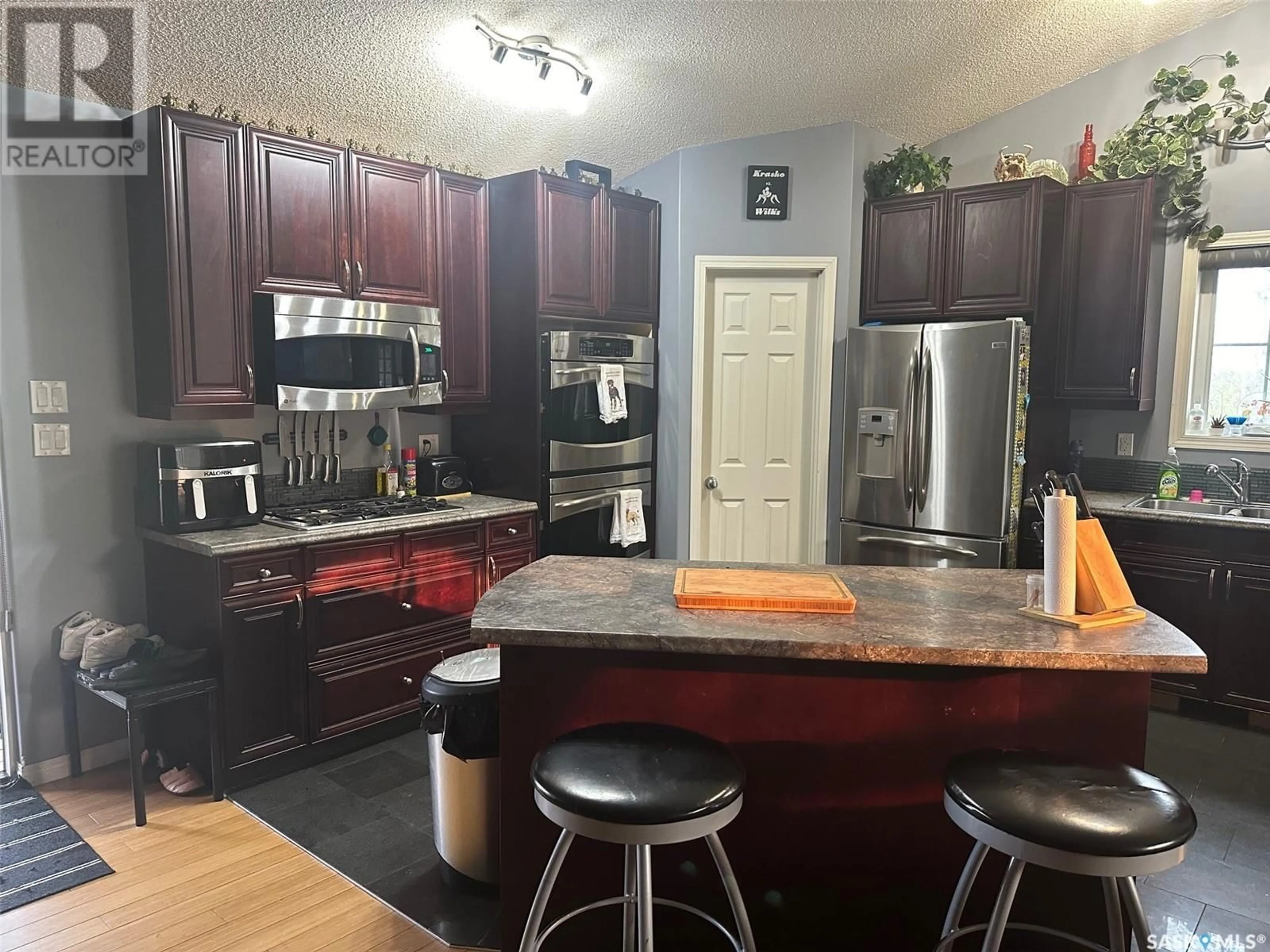 Open concept kitchen, ceramic/tile floor for 1303 STUDER STREET, La Ronge Saskatchewan S0J1L0