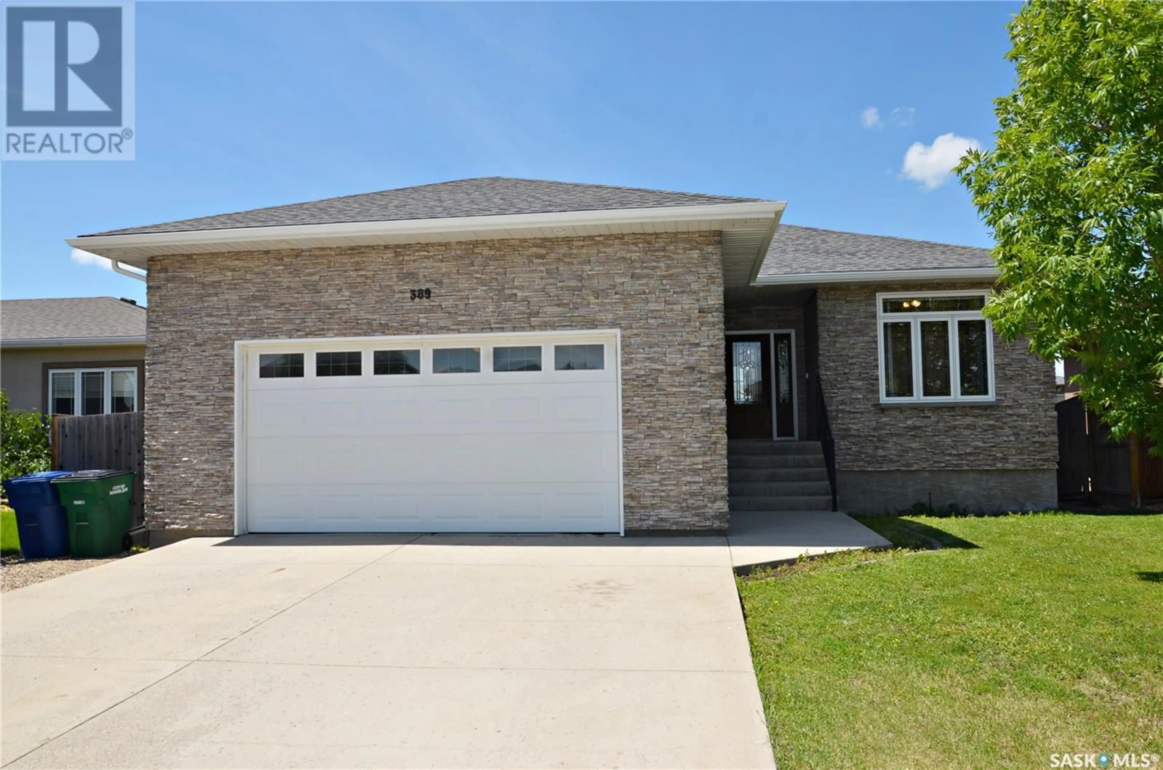 Home with brick exterior material for 389 Wood Lily DRIVE, Moose Jaw Saskatchewan S6J0A2