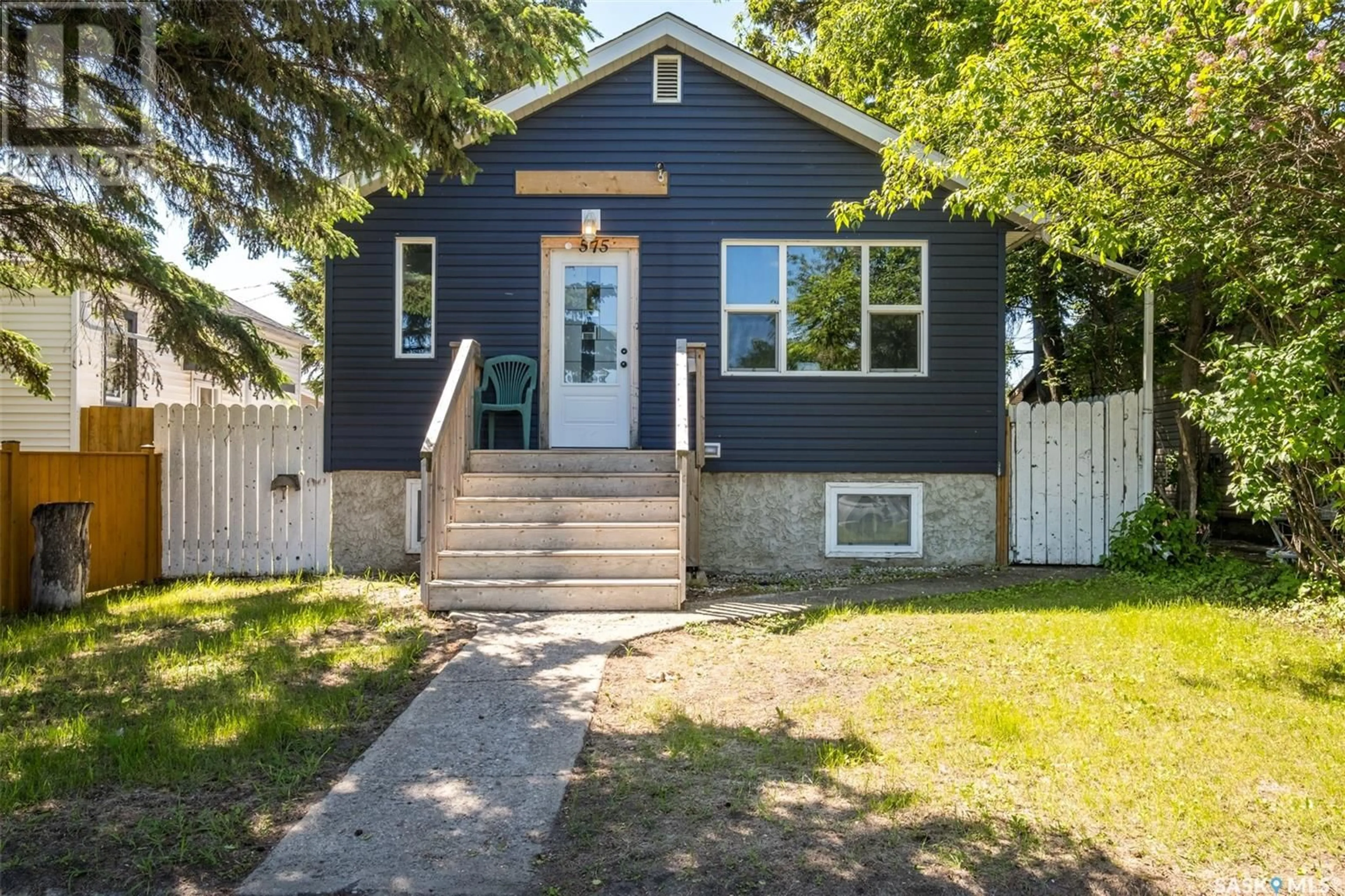 Home with vinyl exterior material, street for 575 12TH STREET, Prince Albert Saskatchewan S6V1C5
