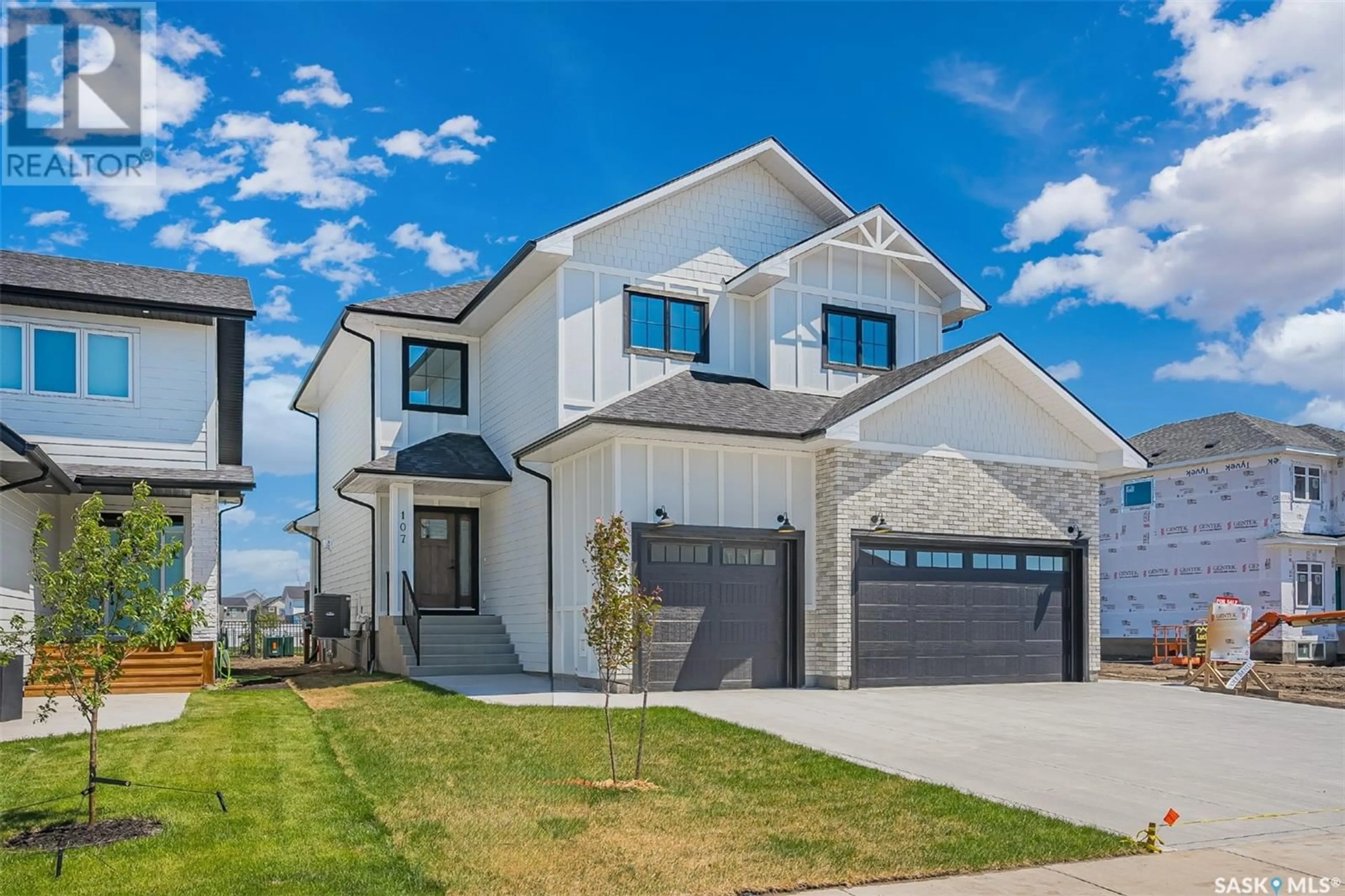 Frontside or backside of a home for 107 Woolf BEND, Saskatoon Saskatchewan S7W0Z6