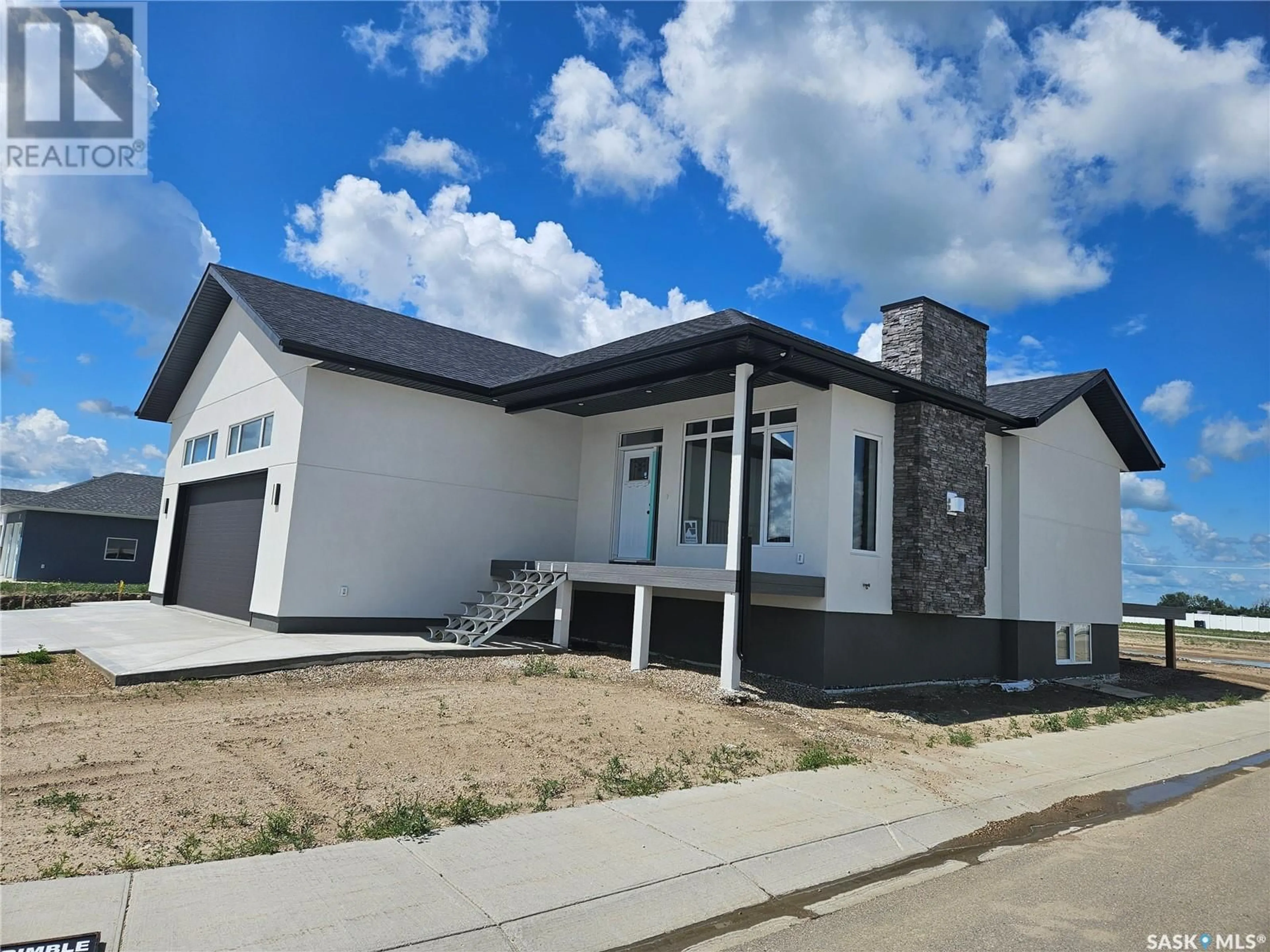 Frontside or backside of a home for 832 Weir CRESCENT, Warman Saskatchewan S0K0A1