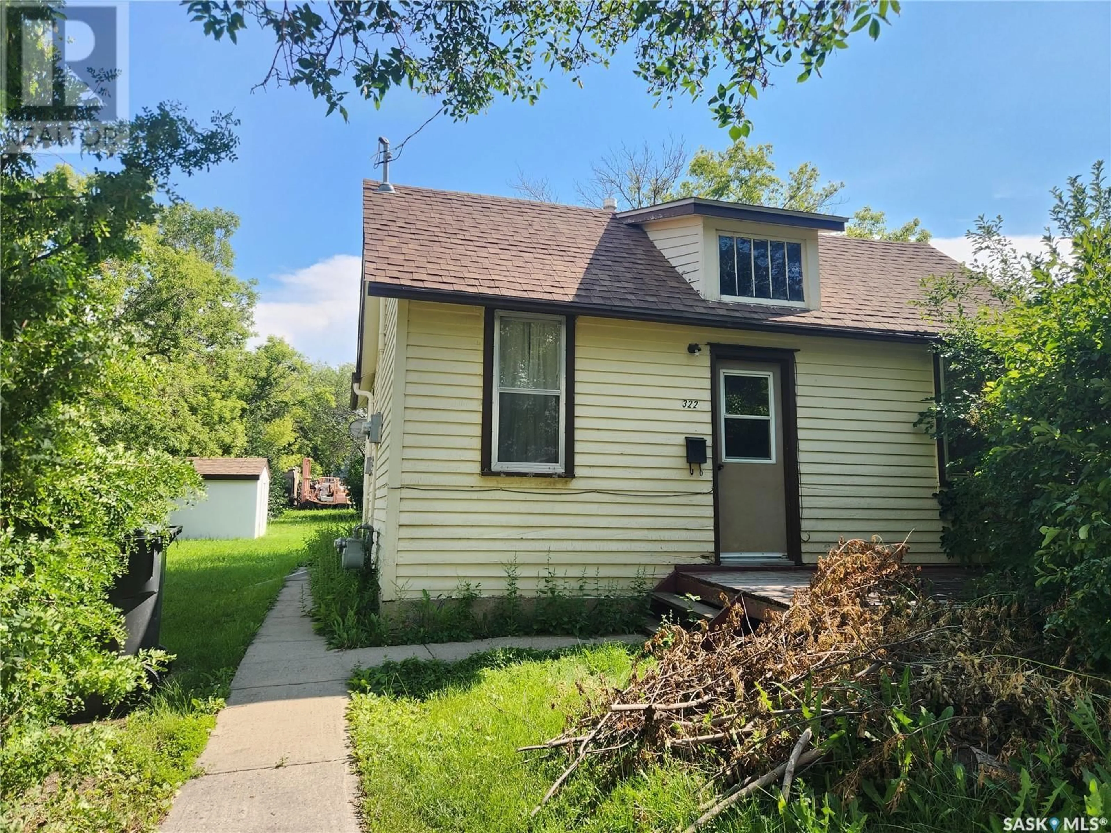 Frontside or backside of a home for 322 2nd AVENUE, Weyburn Saskatchewan S4H1X1