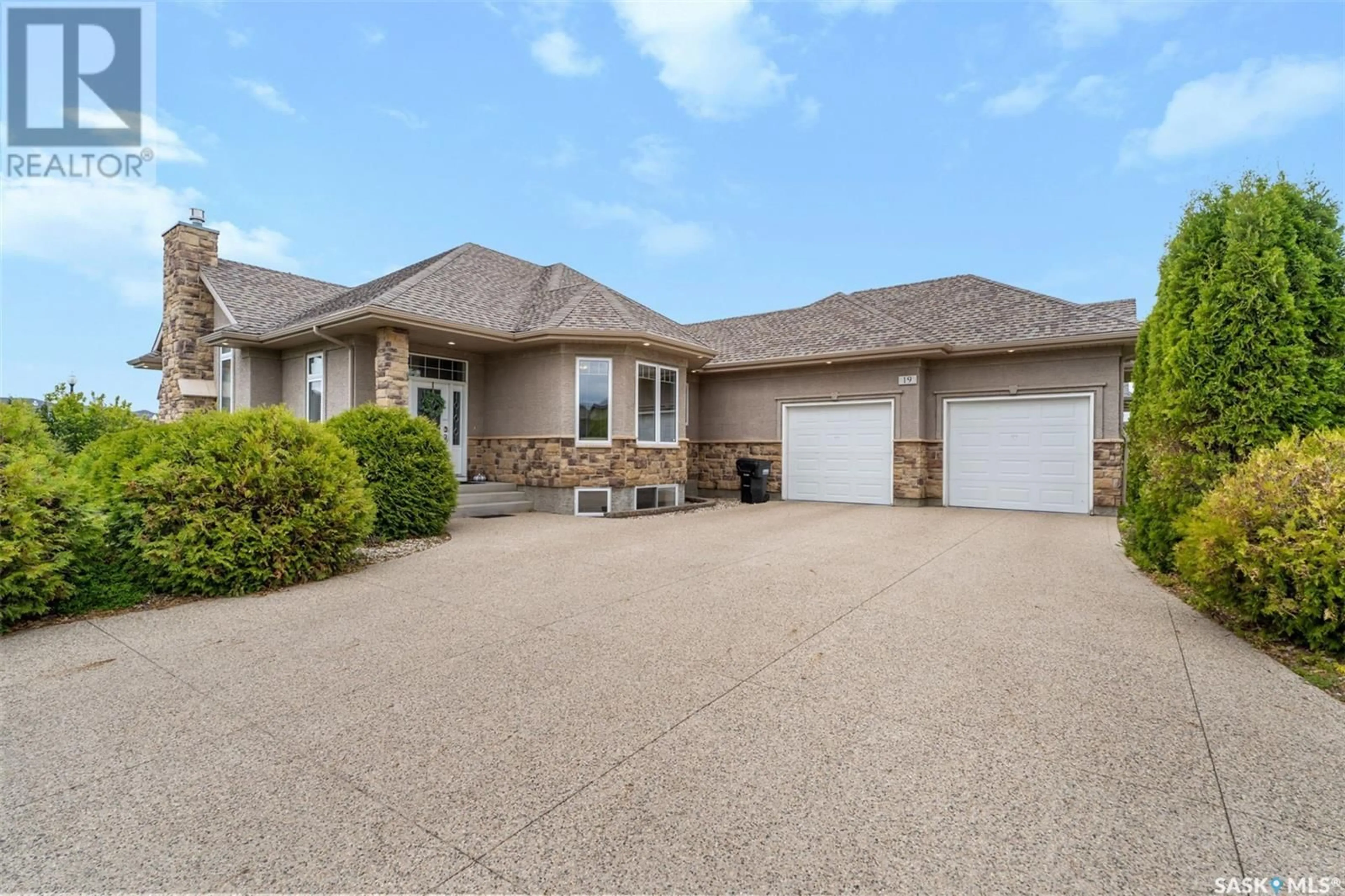 Frontside or backside of a home for 19 501 Cartwright STREET, Saskatoon Saskatchewan S7T1E1