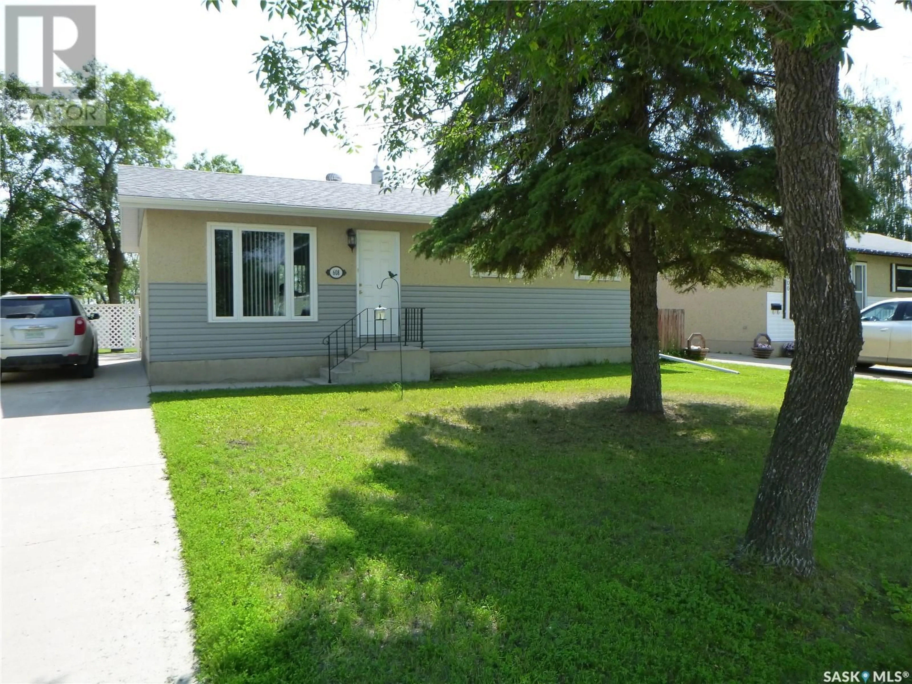 Frontside or backside of a home for 608 97th AVENUE, Tisdale Saskatchewan S0E1T0