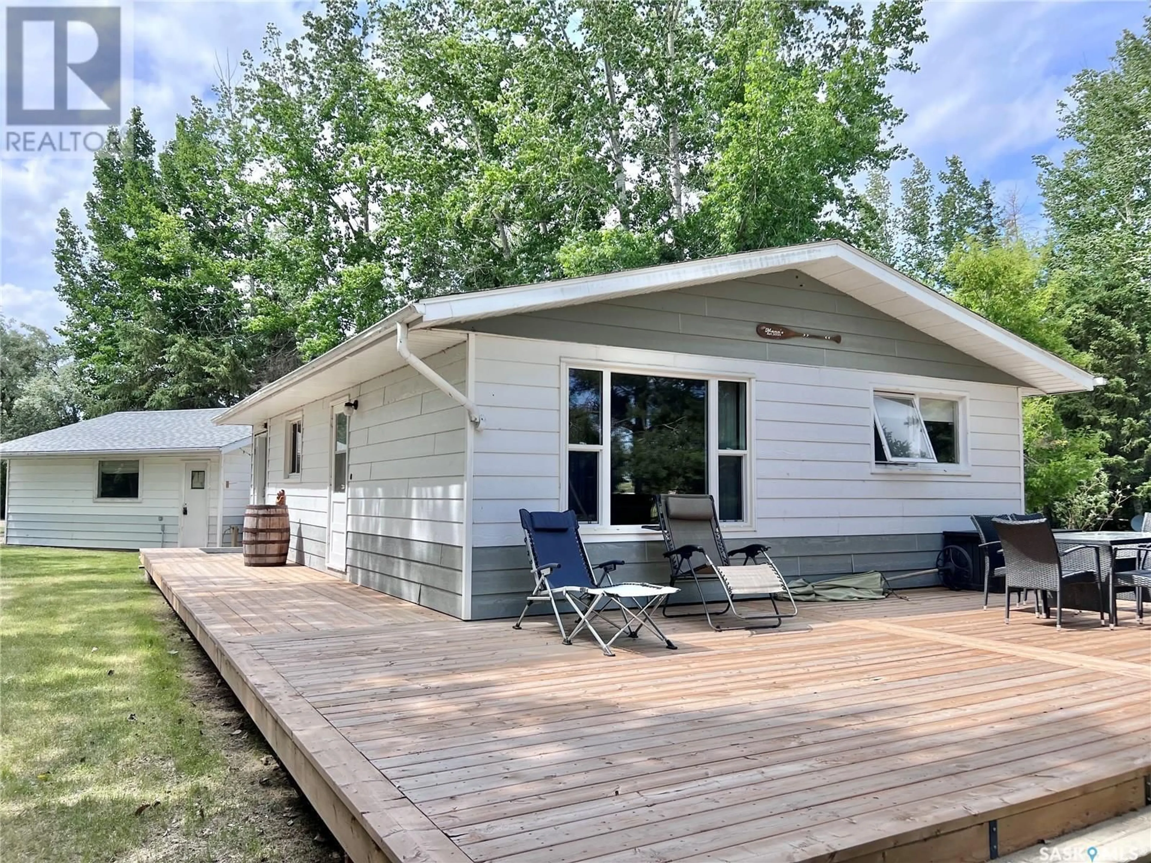 Home with vinyl exterior material for 210 Ruby DRIVE, Hitchcock Bay Saskatchewan S0L0G0