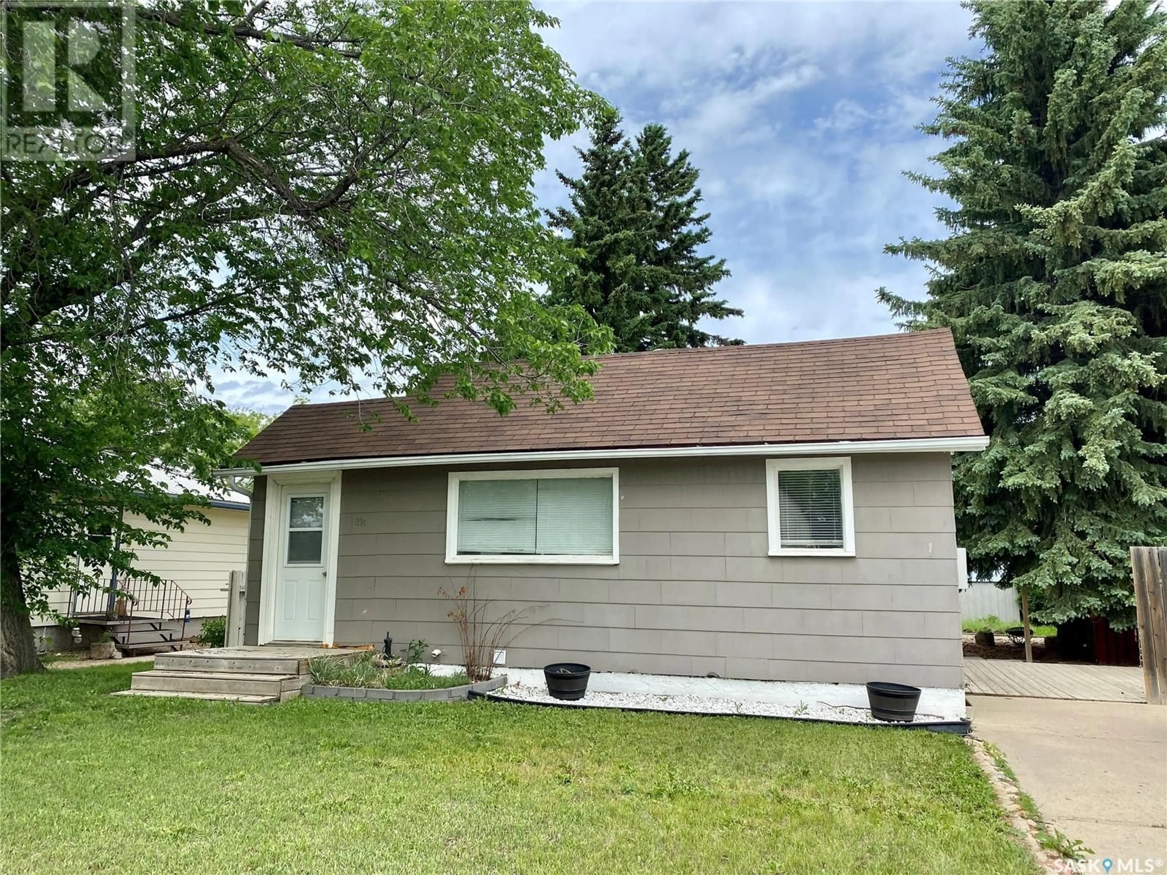 Frontside or backside of a home for 214 3rd AVENUE W, Watrous Saskatchewan S0K4T0