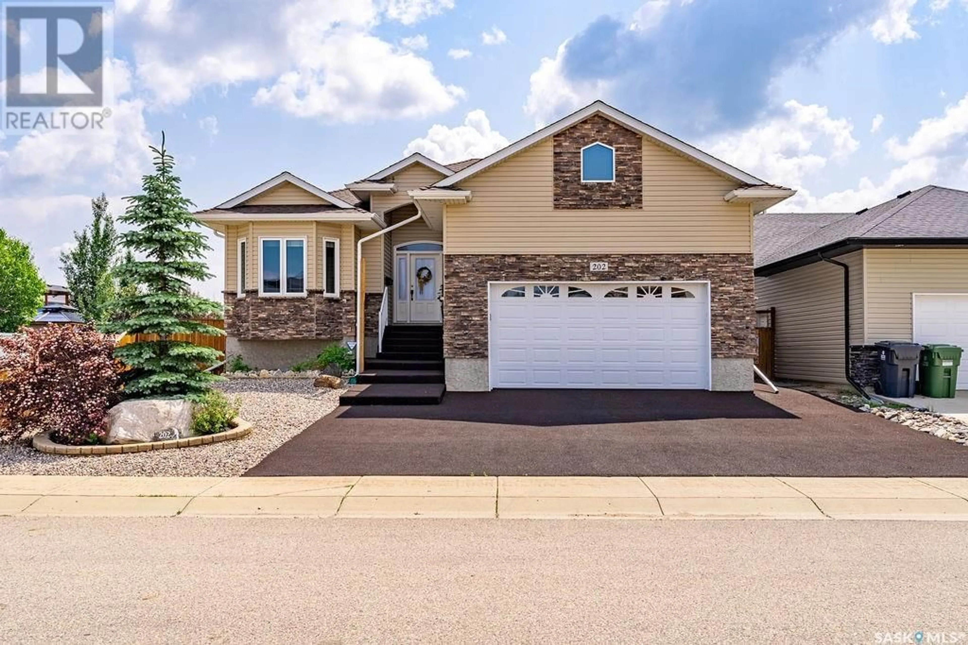 Frontside or backside of a home for 202 Player CRESCENT, Warman Saskatchewan S0K4S0