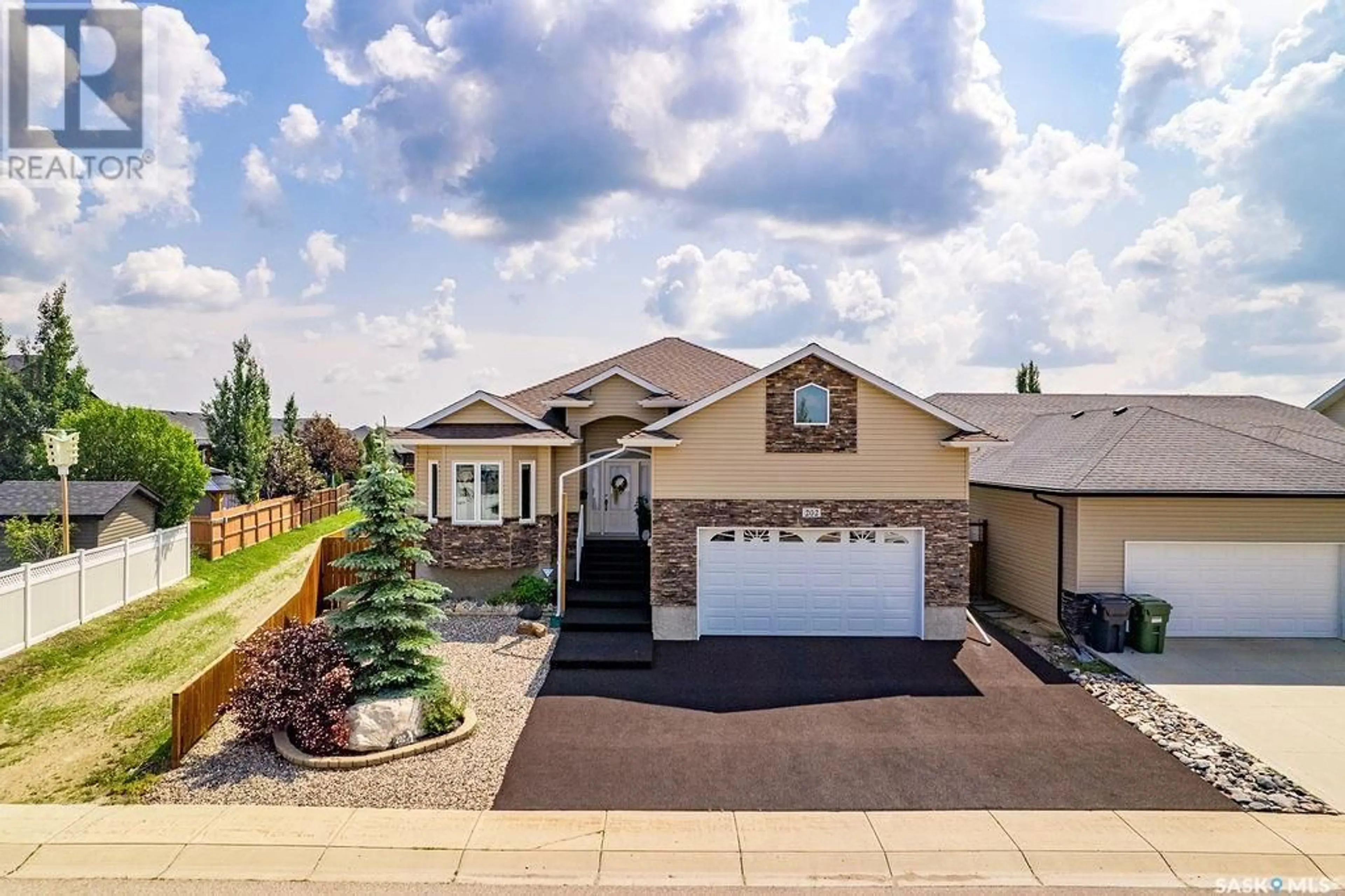 Frontside or backside of a home for 202 Player CRESCENT, Warman Saskatchewan S0K4S0