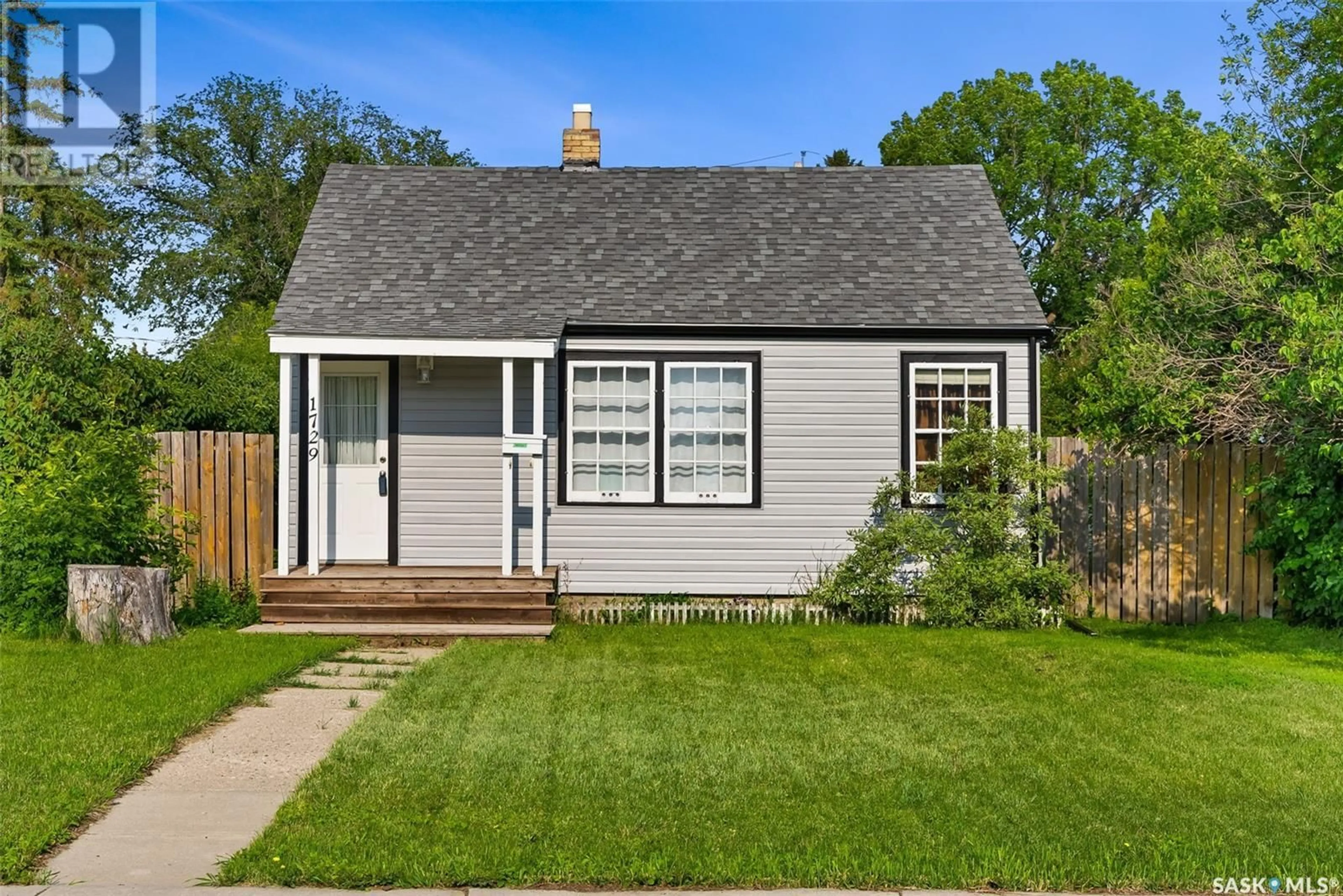 Frontside or backside of a home for 1729 McIntosh STREET, Regina Saskatchewan S4T5C6