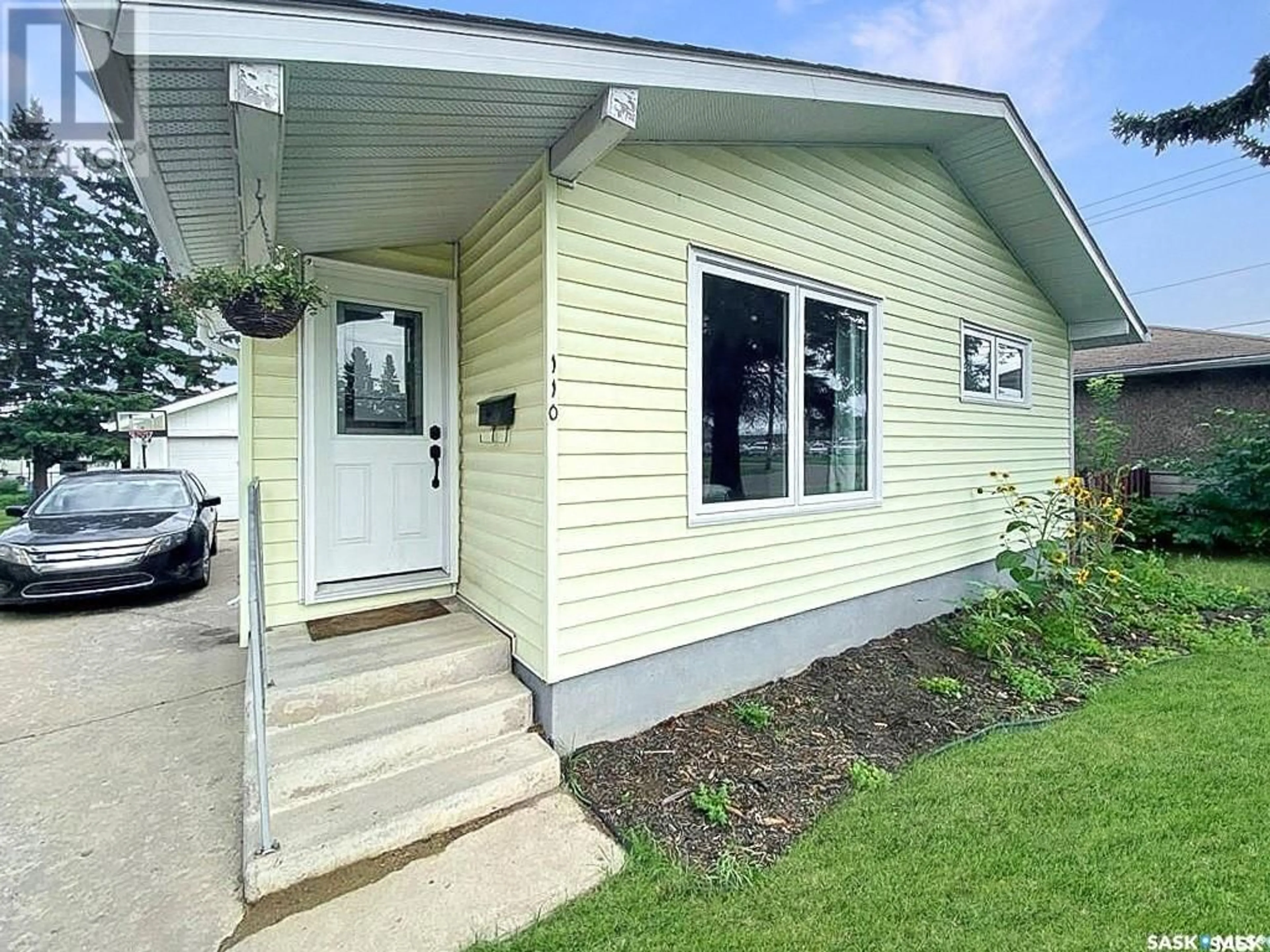 Home with vinyl exterior material for 110 31st STREET W, Prince Albert Saskatchewan S6V4T8