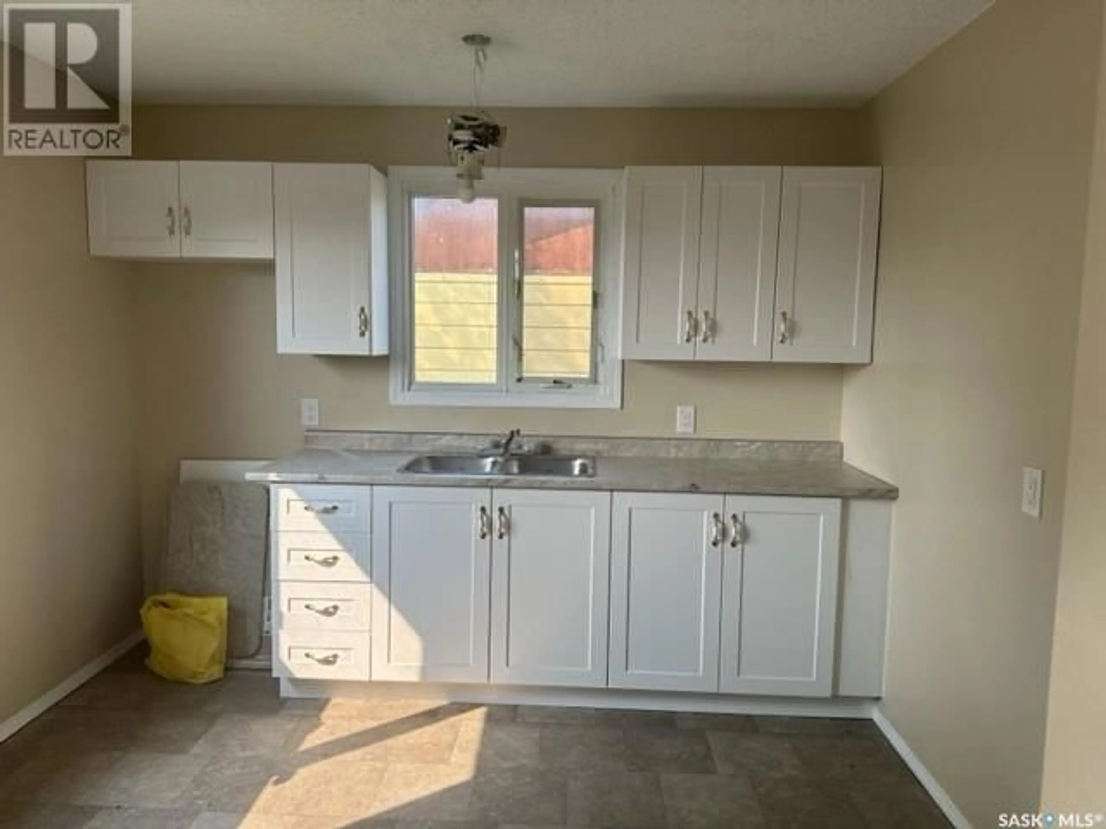 Standard kitchen, ceramic/tile floor for 504 COOK CRESCENT, La Ronge Saskatchewan S0J1L0