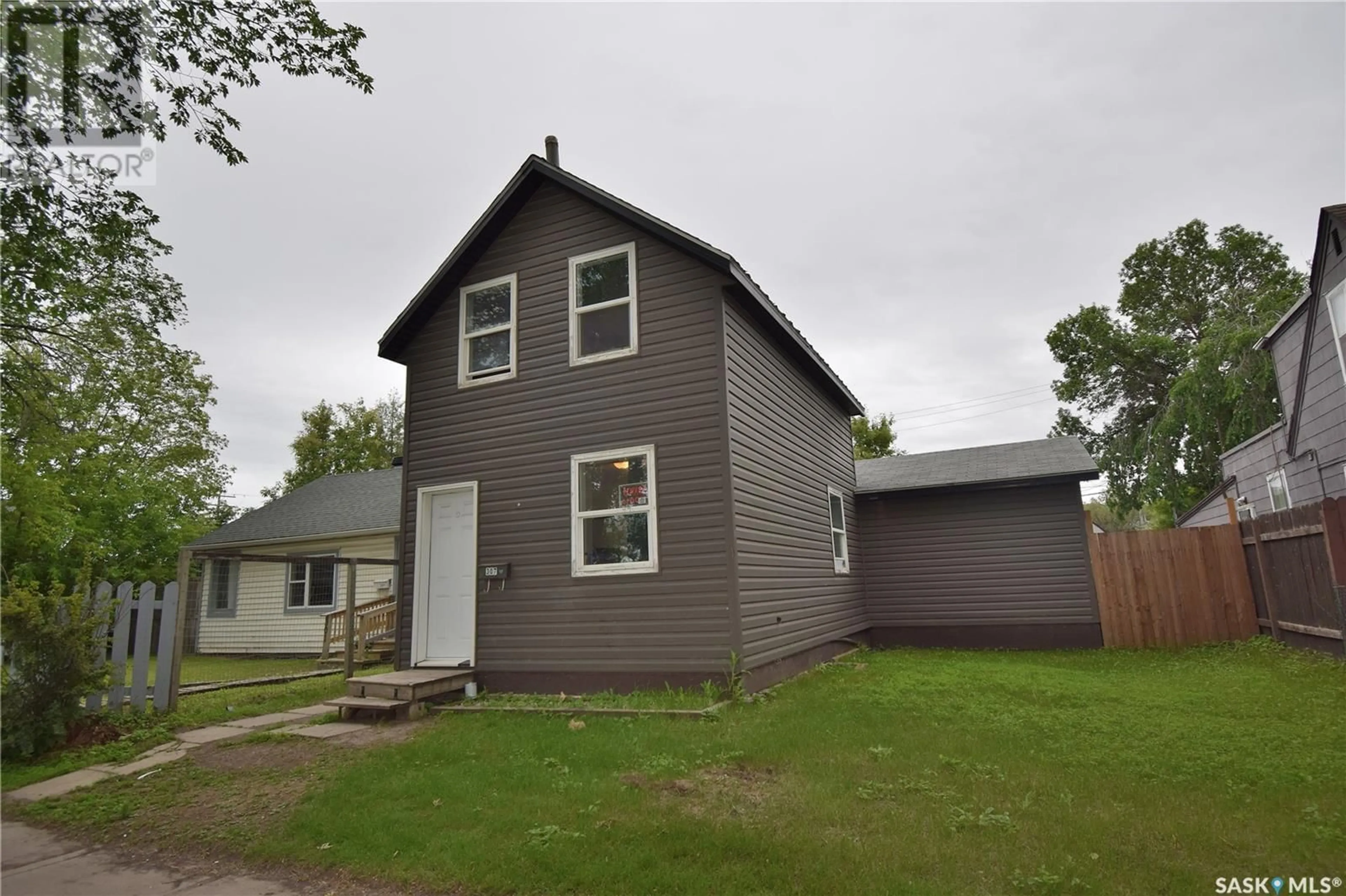 Frontside or backside of a home for 307 15th STREET W, Prince Albert Saskatchewan S6V3R1