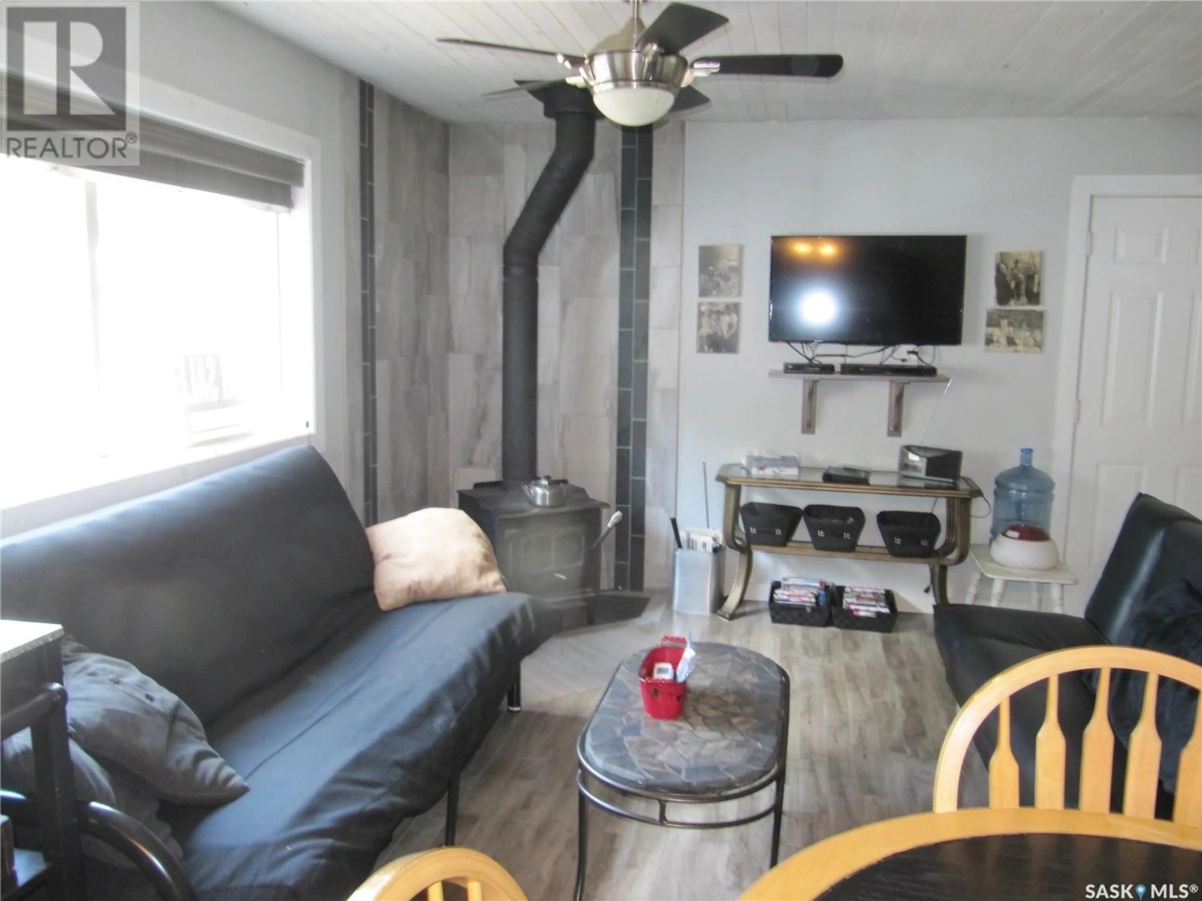 Living room with furniture, unknown for 20 WAINO'S ROAD, Kivimaa-Moonlight Bay Saskatchewan S0M1J0