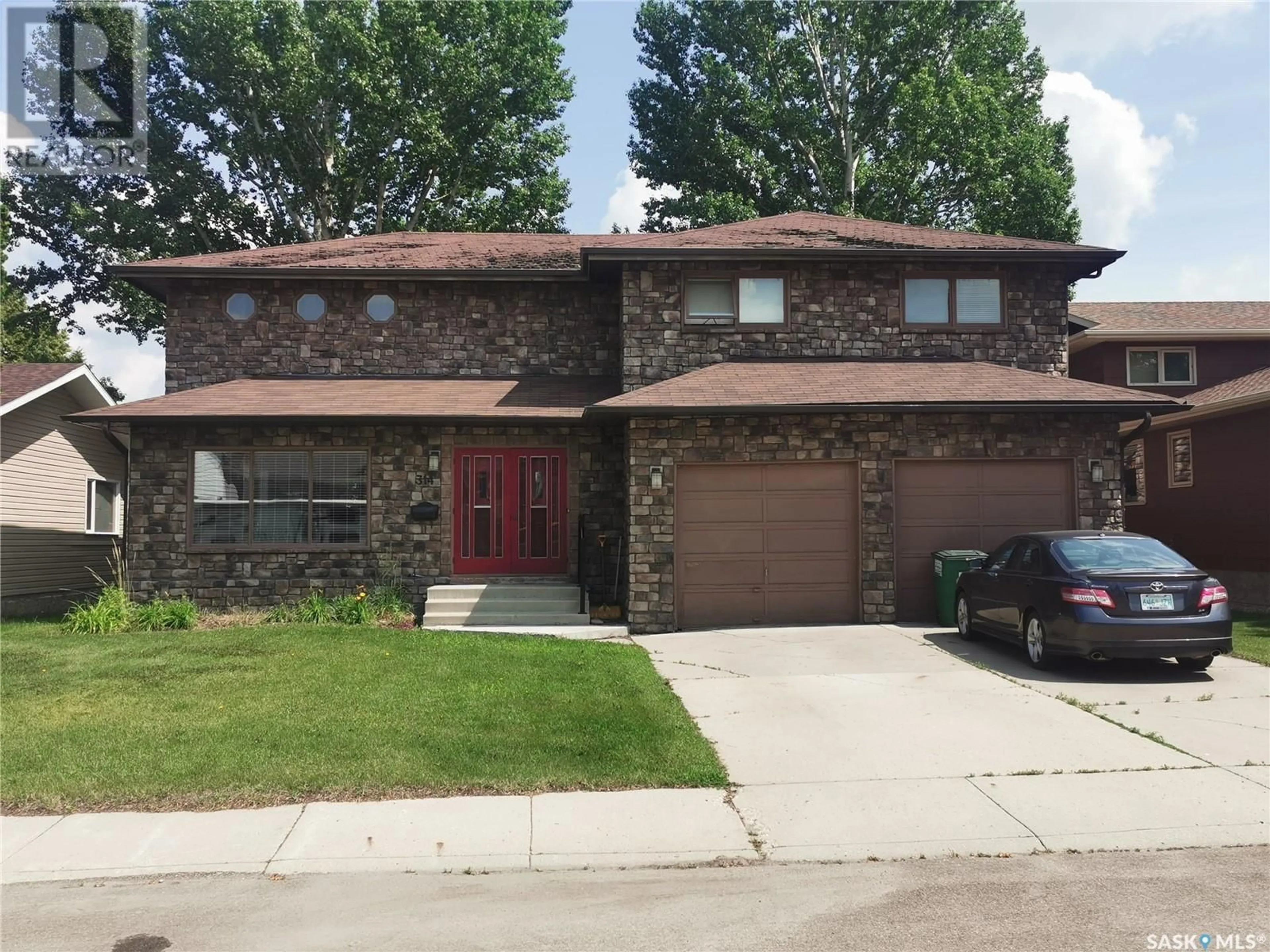 Home with brick exterior material for 314 Dore WAY, Saskatoon Saskatchewan S7K4X9