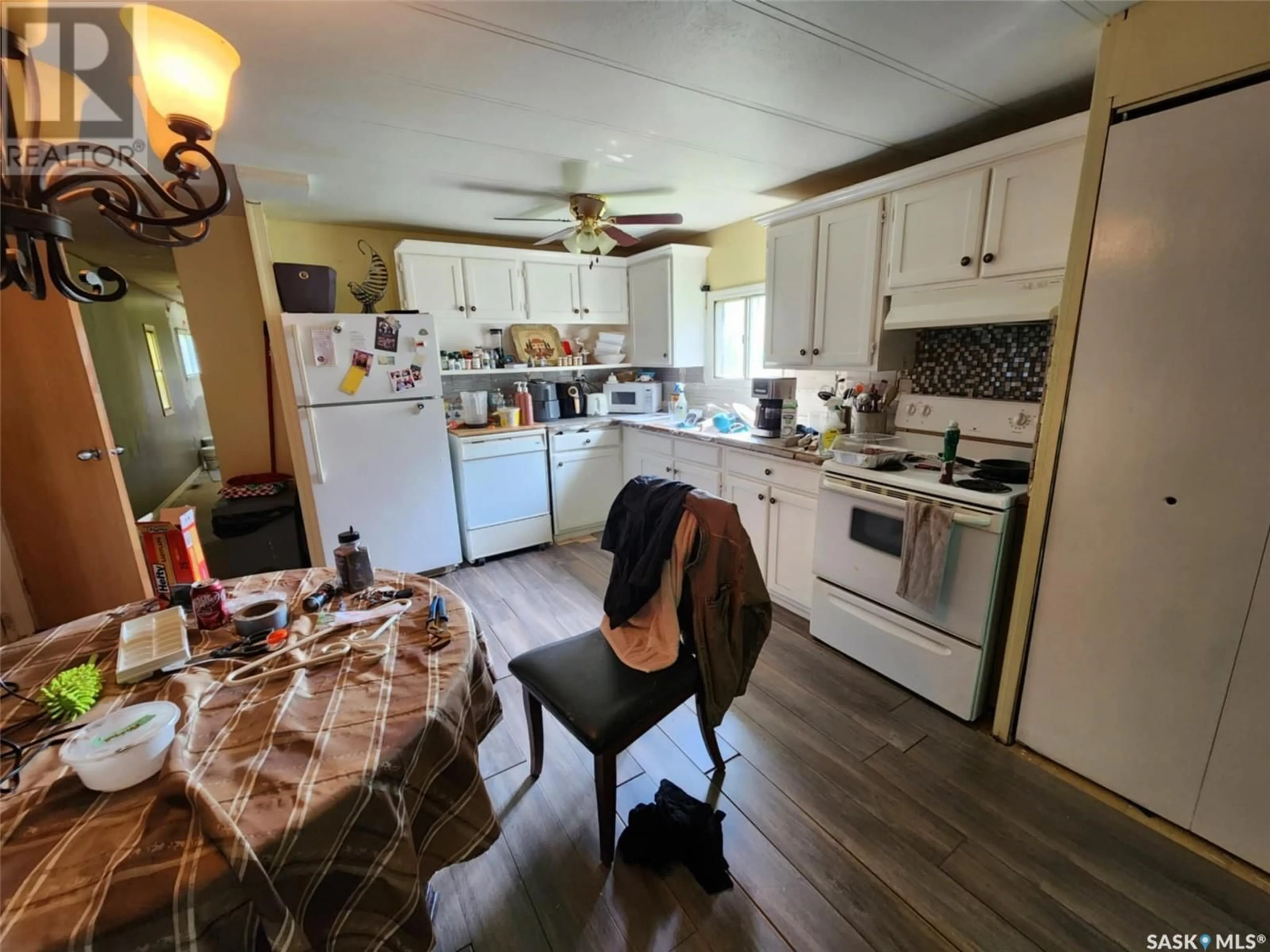 Standard kitchen, wood floors, cottage for 79 Spruce STREET, Caronport Saskatchewan S0H0S0