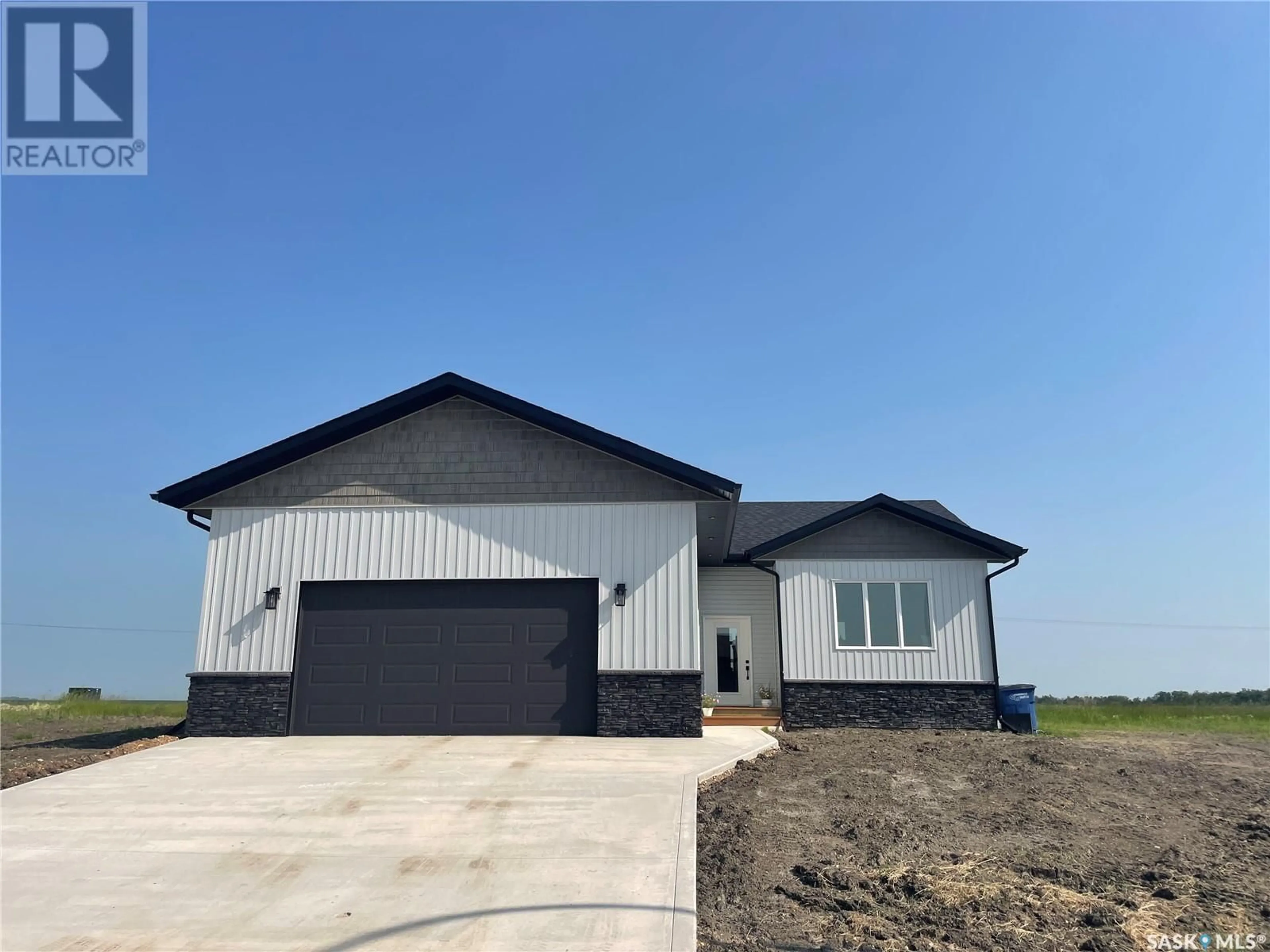 Frontside or backside of a home for 715 Doghide DRIVE, Tisdale Saskatchewan S0E1T0