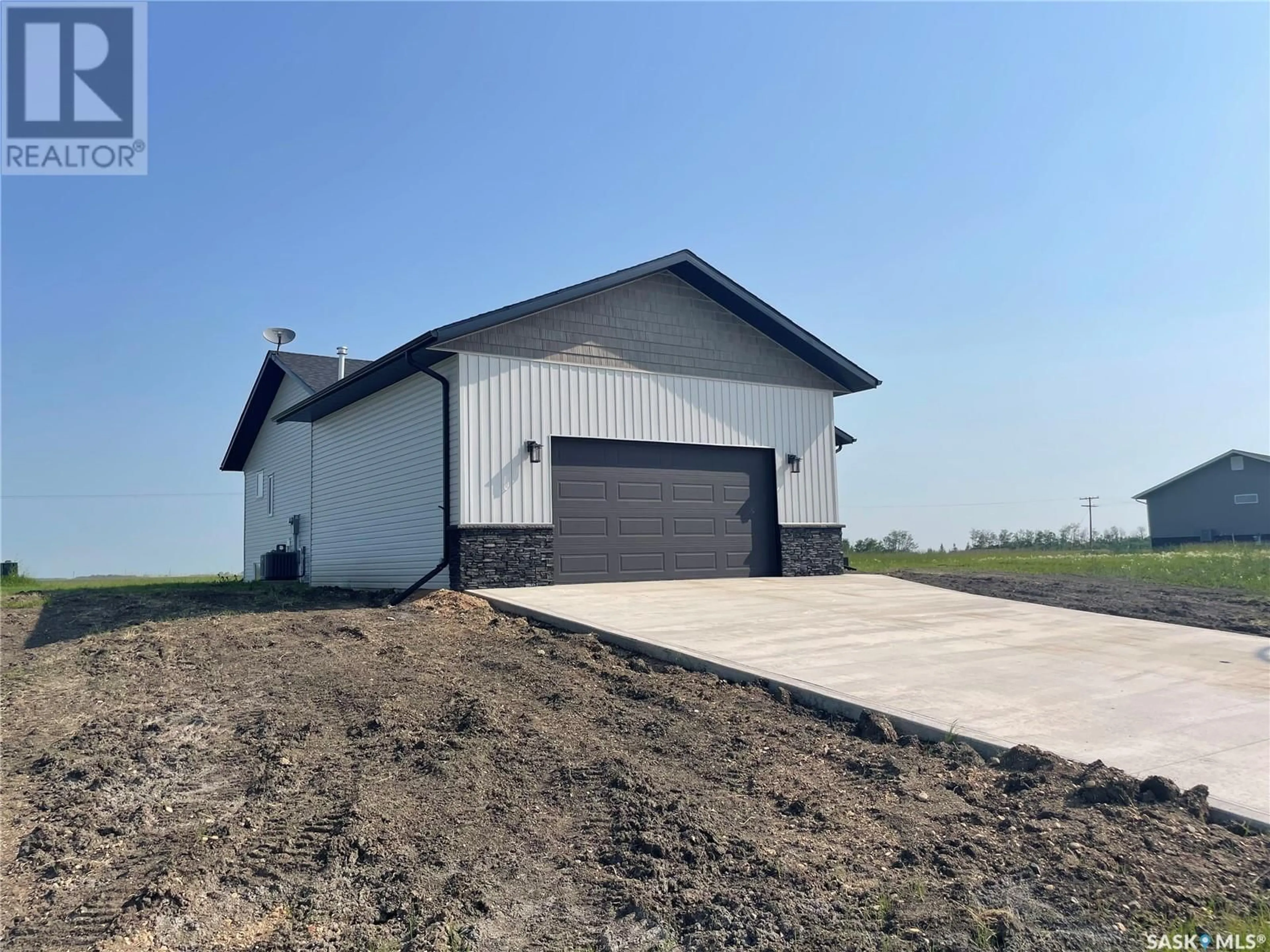 Frontside or backside of a home for 715 Doghide DRIVE, Tisdale Saskatchewan S0E1T0