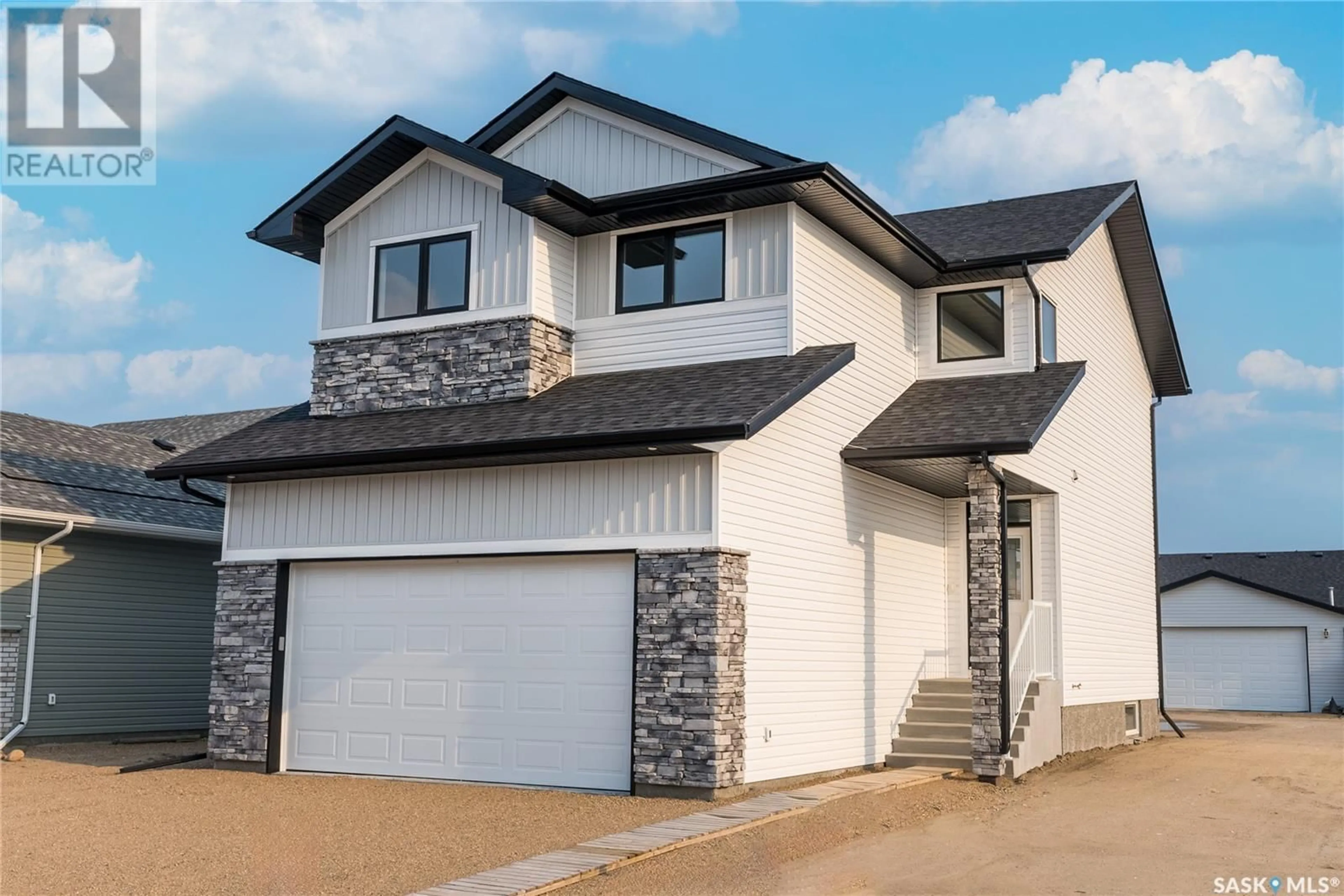 Frontside or backside of a home for 705 Sarazen DRIVE, Warman Saskatchewan S0K4S0