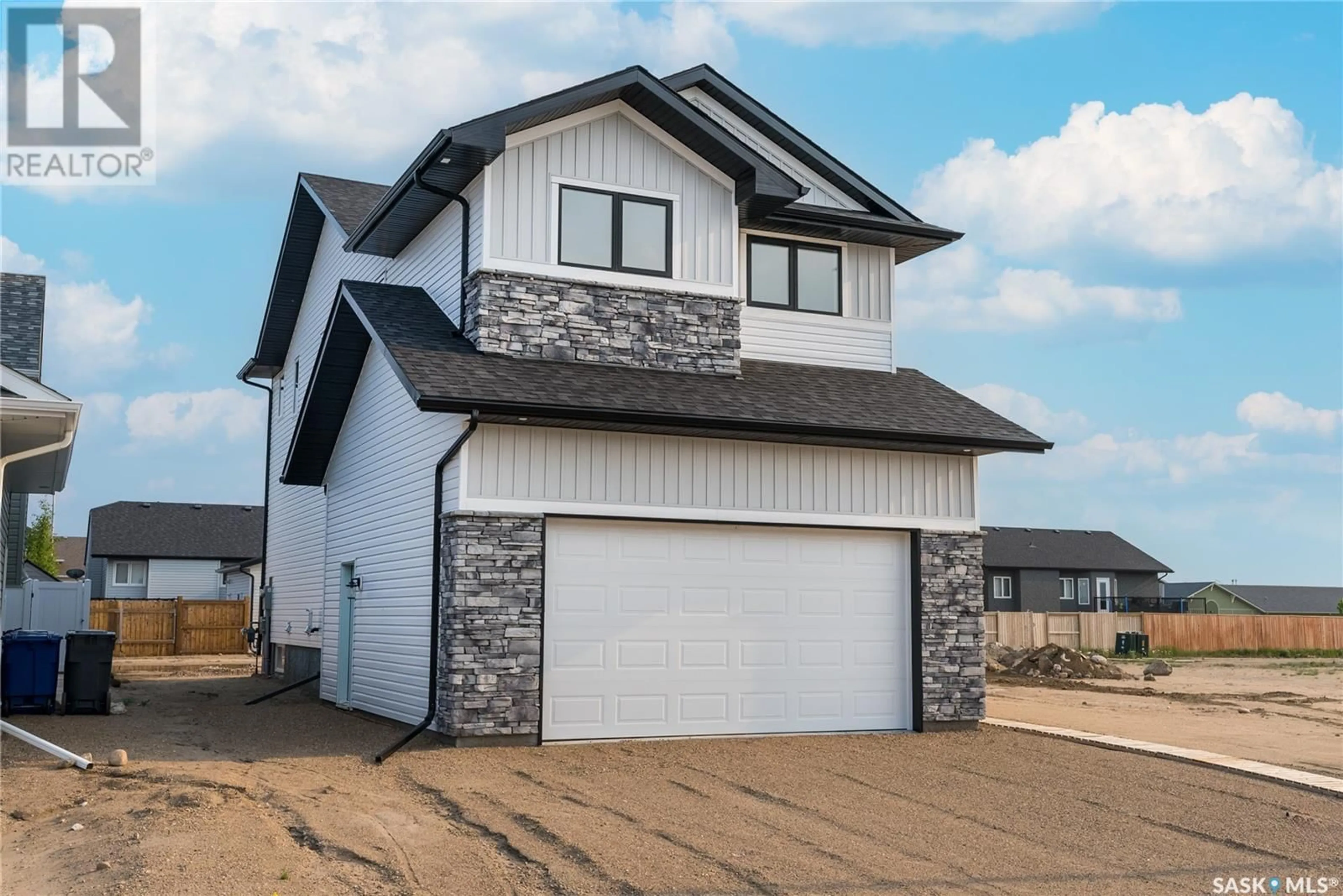 Frontside or backside of a home for 705 Sarazen DRIVE, Warman Saskatchewan S0K4S0