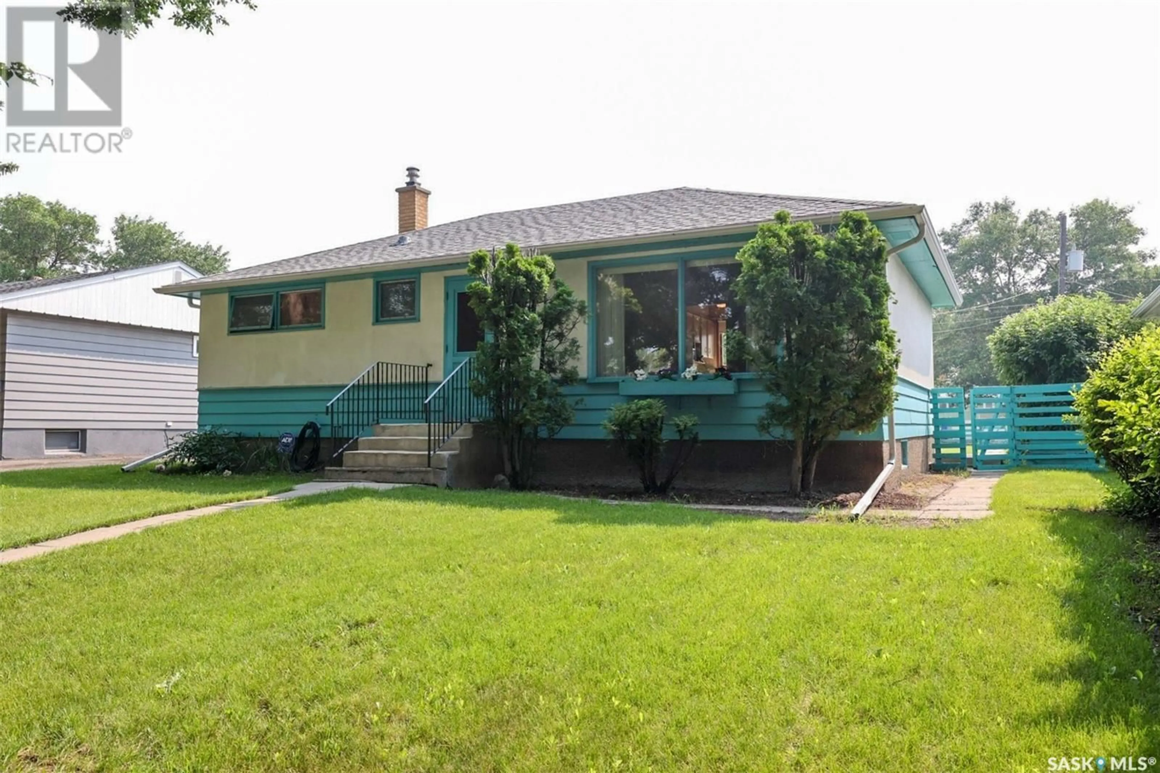 Frontside or backside of a home, the fenced backyard for 251 Toronto STREET N, Regina Saskatchewan S4R2T5