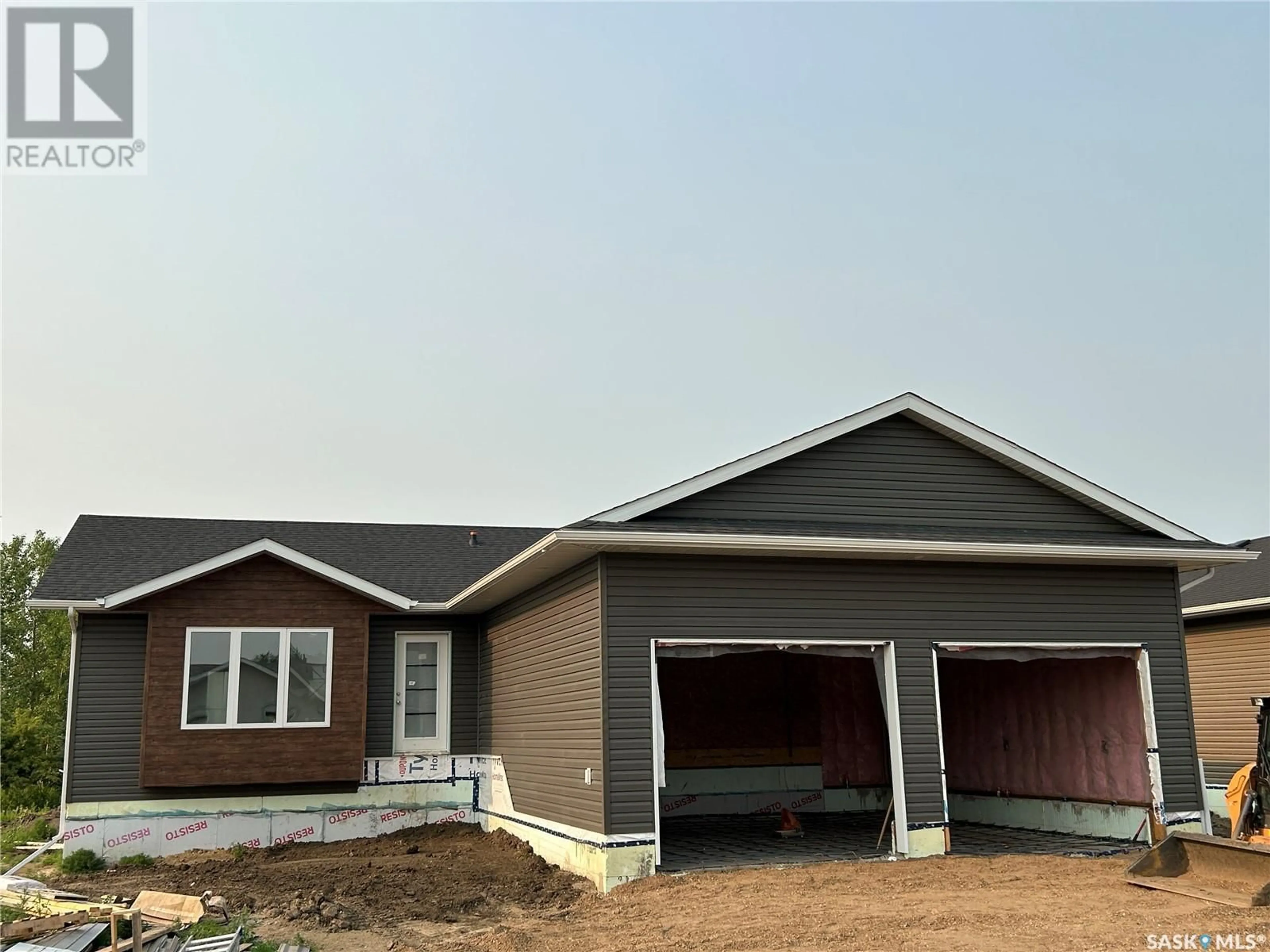 Frontside or backside of a home, the front or back of building for 218 Kestrel COURT, Rosthern Saskatchewan S0K3R0