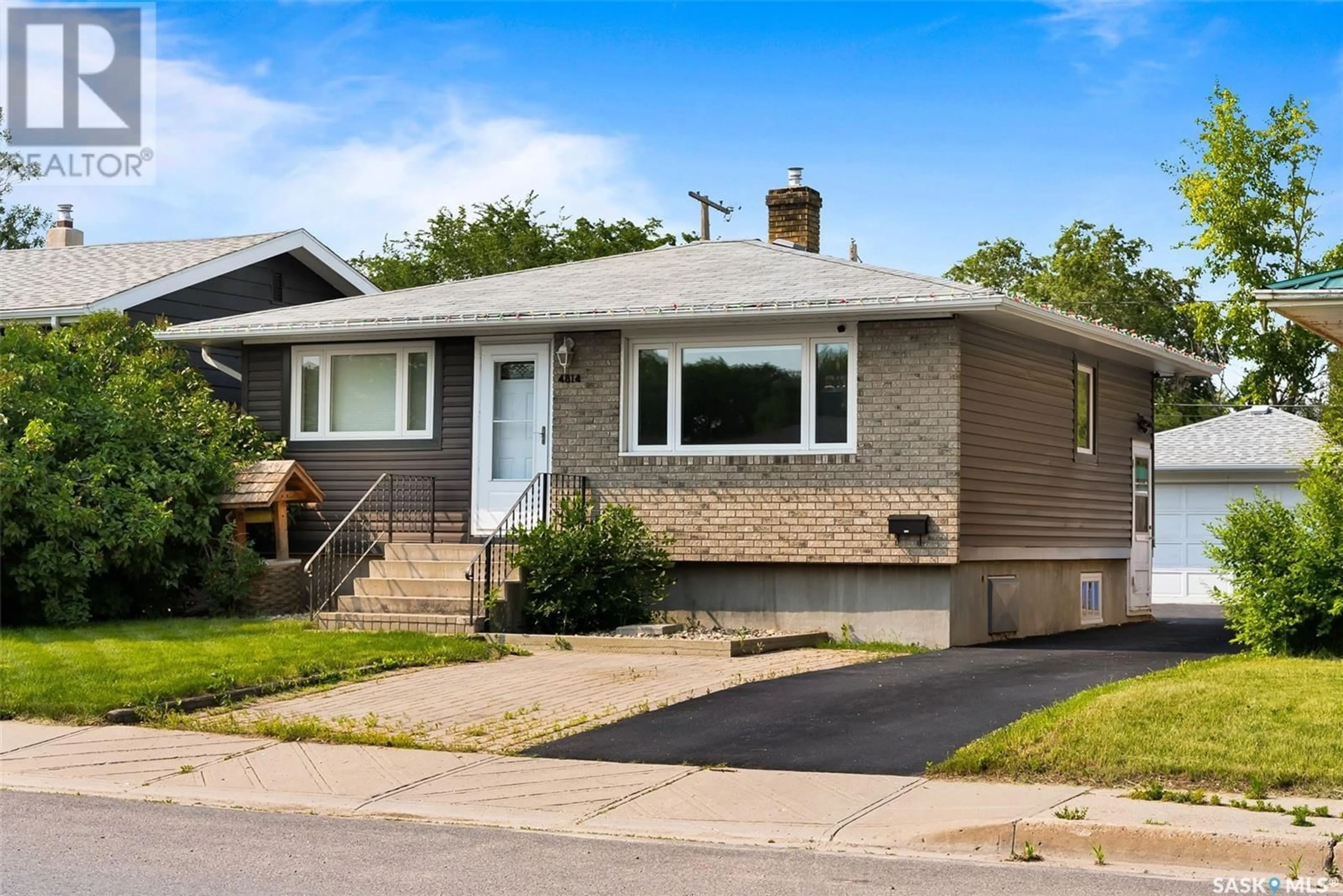 Frontside or backside of a home for 4814 7TH AVENUE, Regina Saskatchewan S4T0R7