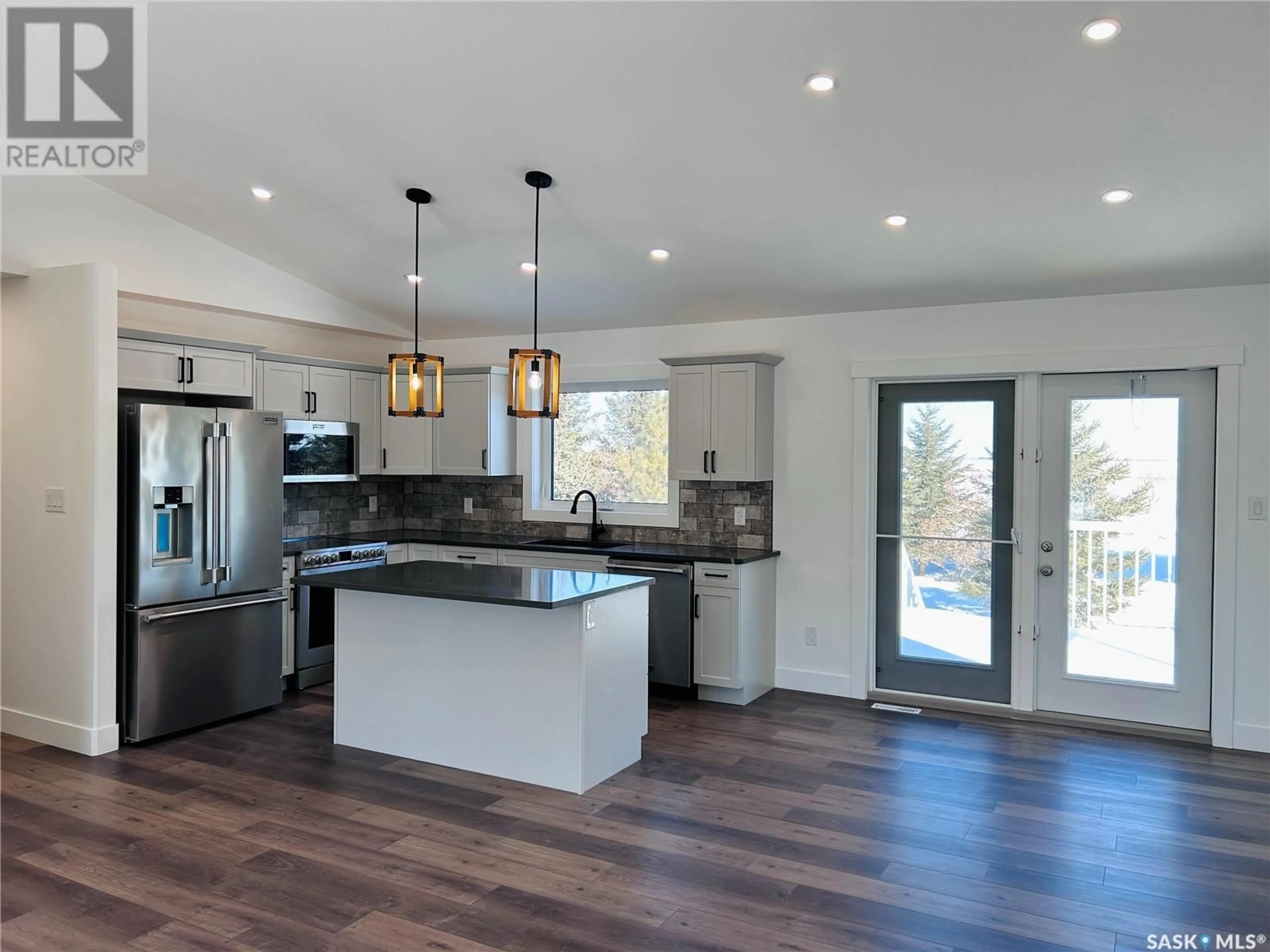 Open concept kitchen, unknown for 216 KESTREL COURT, Rosthern Saskatchewan S0K3R0