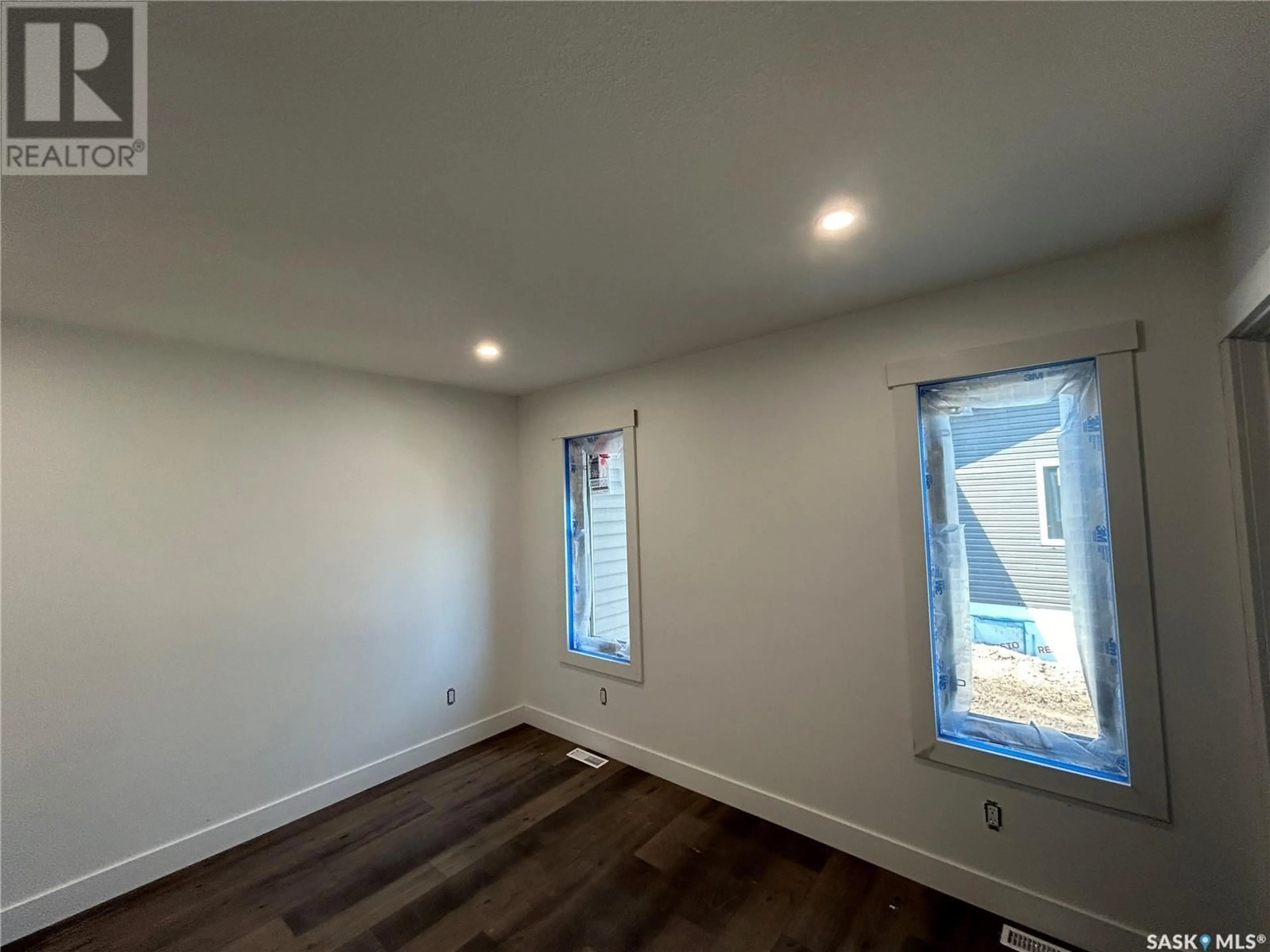 A pic of a room, wood floors for 216 Kestrel COURT, Rosthern Saskatchewan S0K3R0