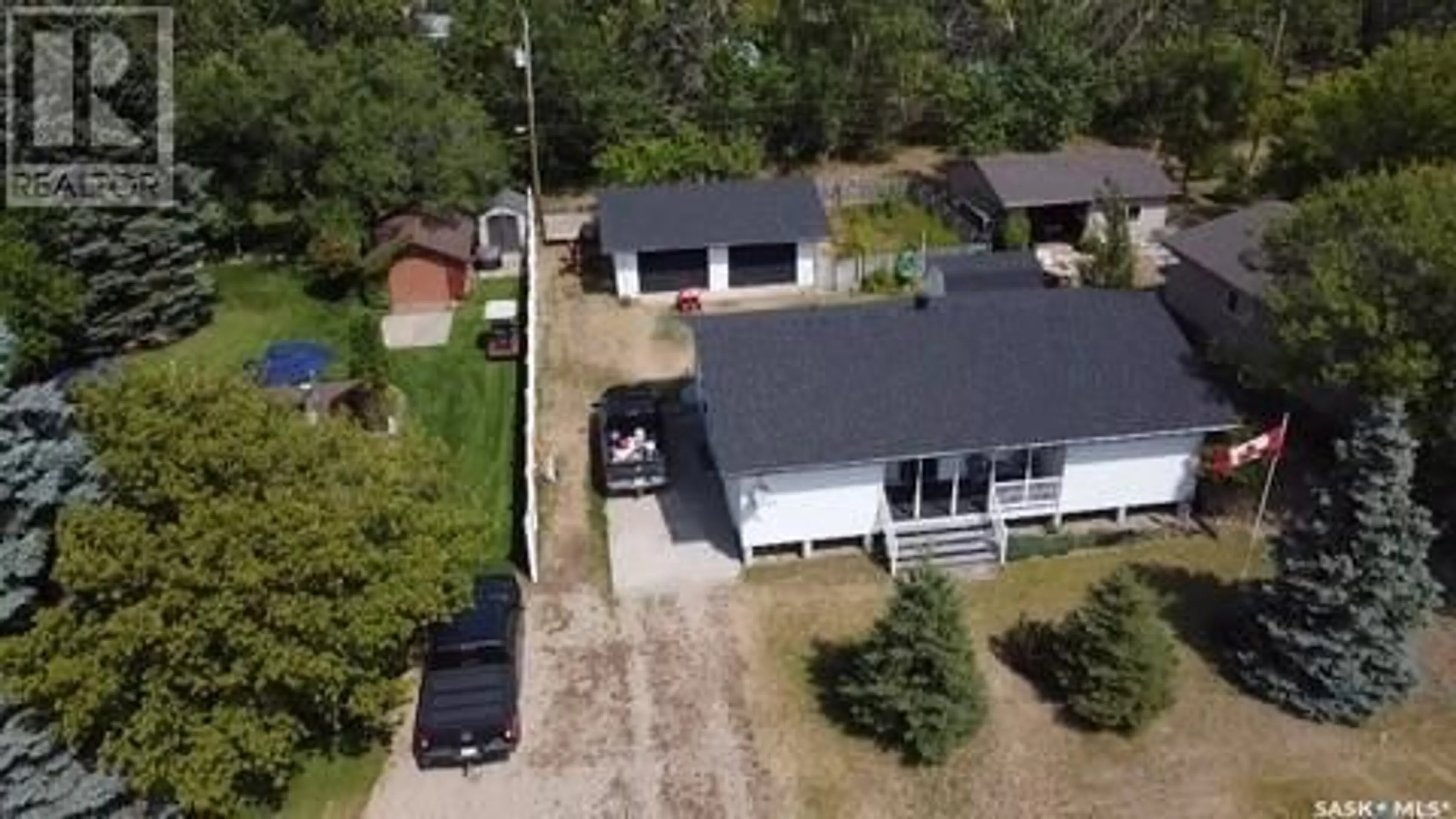 A pic from outside/outdoor area/front of a property/back of a property/a pic from drone, street for 613 Sakuhikan DRIVE, Mistusinne Saskatchewan S0H1J0