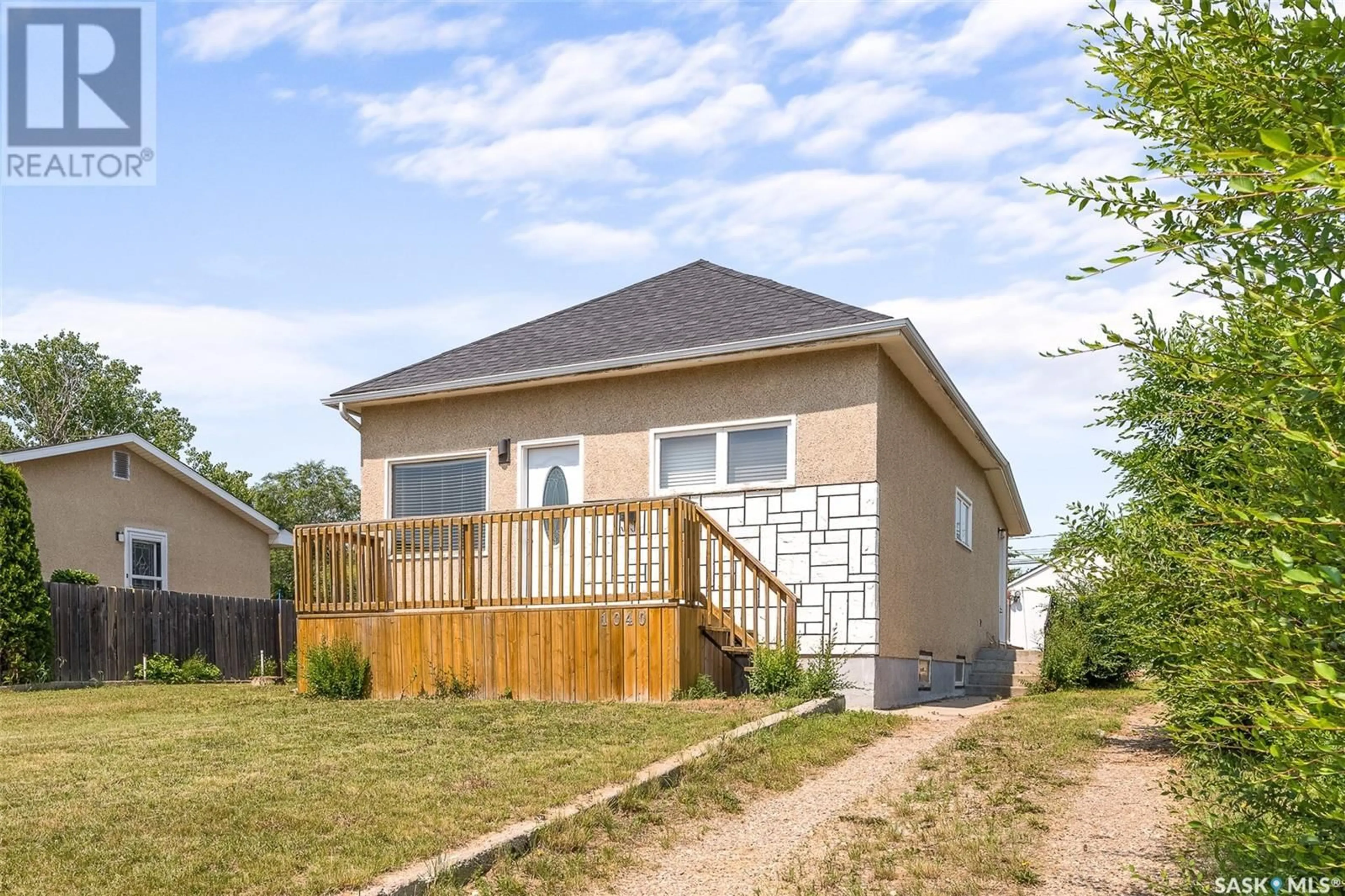 Frontside or backside of a home for 1040 Ominica STREET E, Moose Jaw Saskatchewan S6H0J3