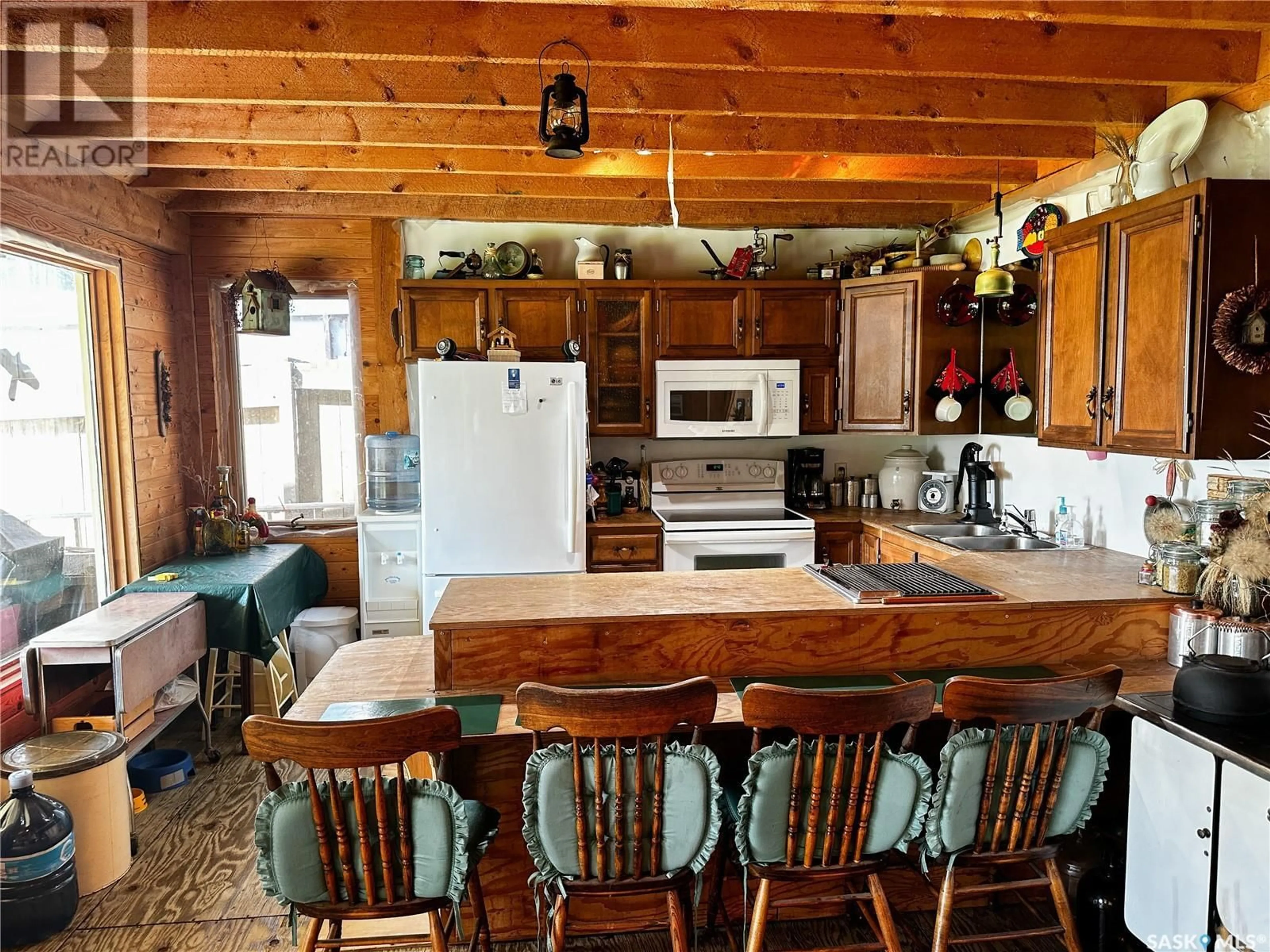 Rustic kitchen for 15 Lake AVENUE, Martinsons Beach Saskatchewan S0M1X0