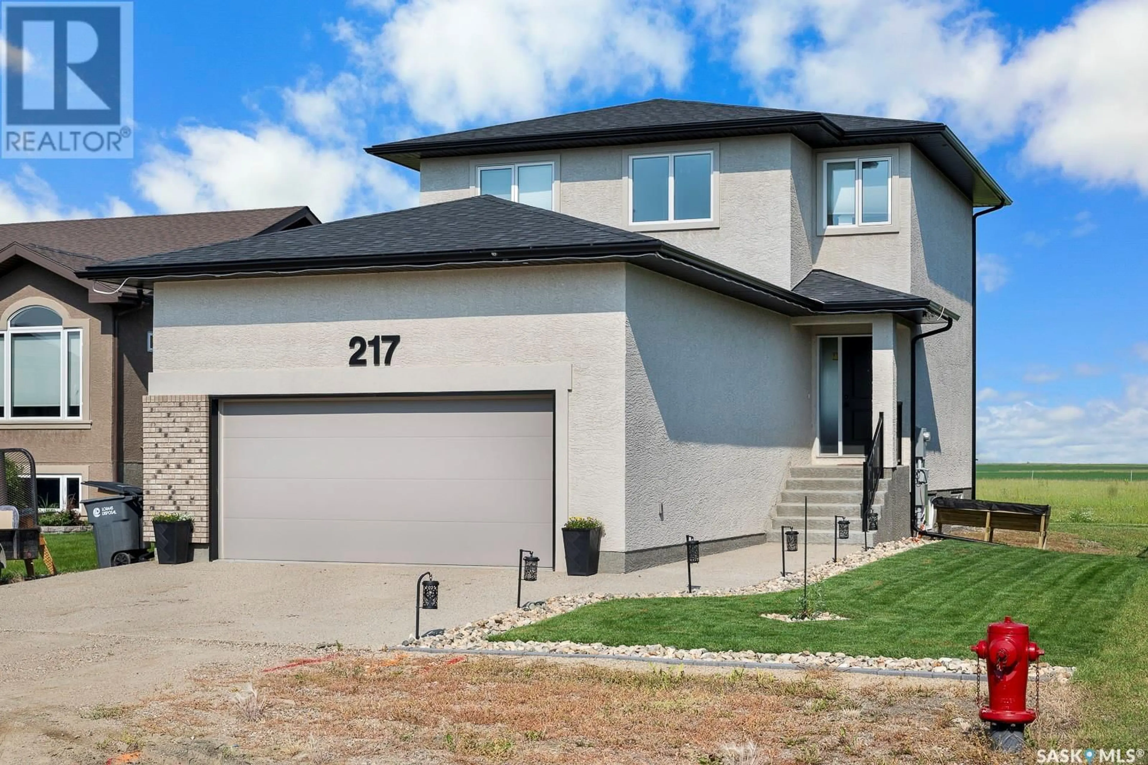 Frontside or backside of a home for 217 Willow STREET, Pense Saskatchewan S0G3W0