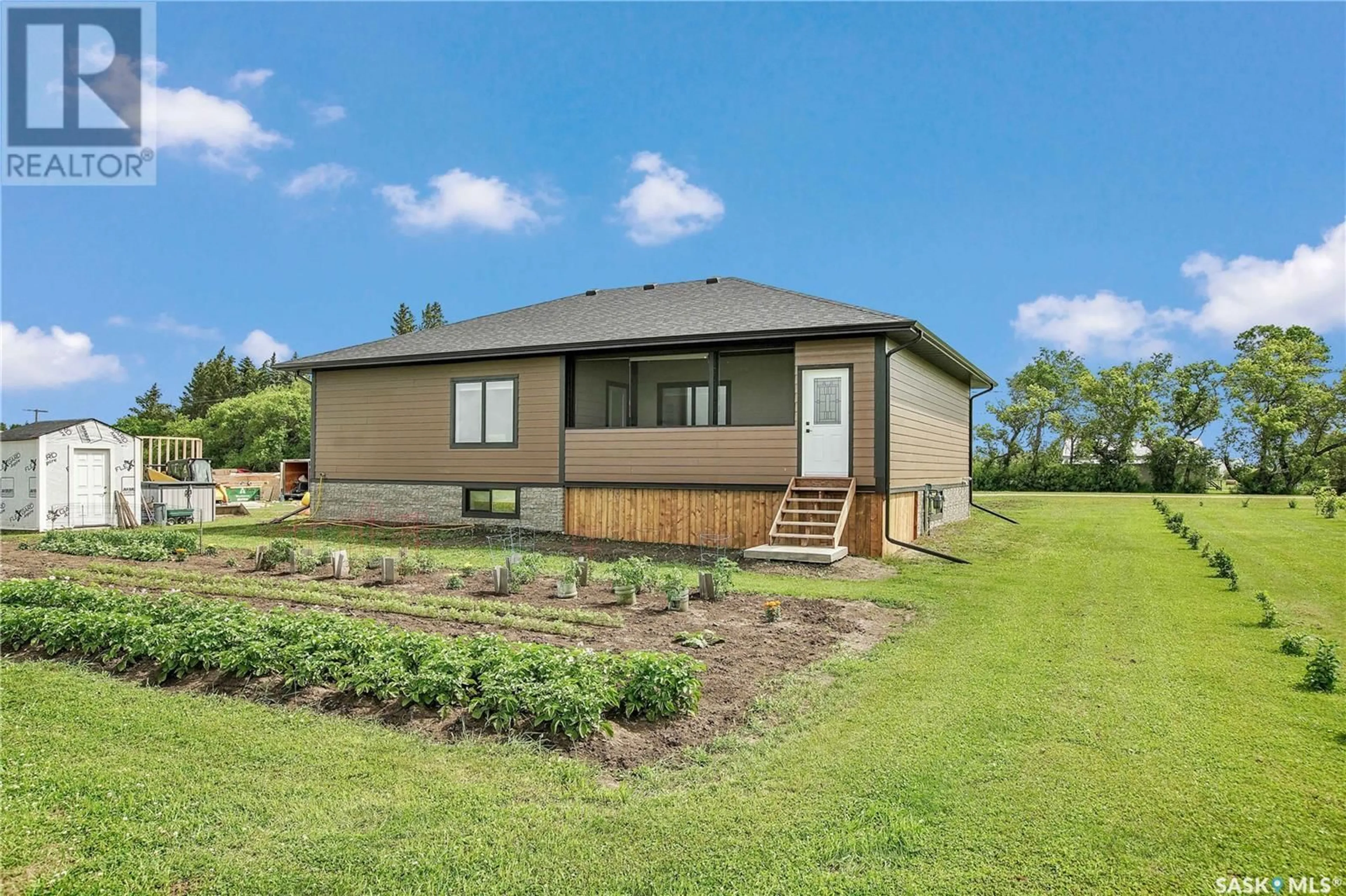 Frontside or backside of a home for 6065 2nd AVENUE, Laird Saskatchewan S0K2H0