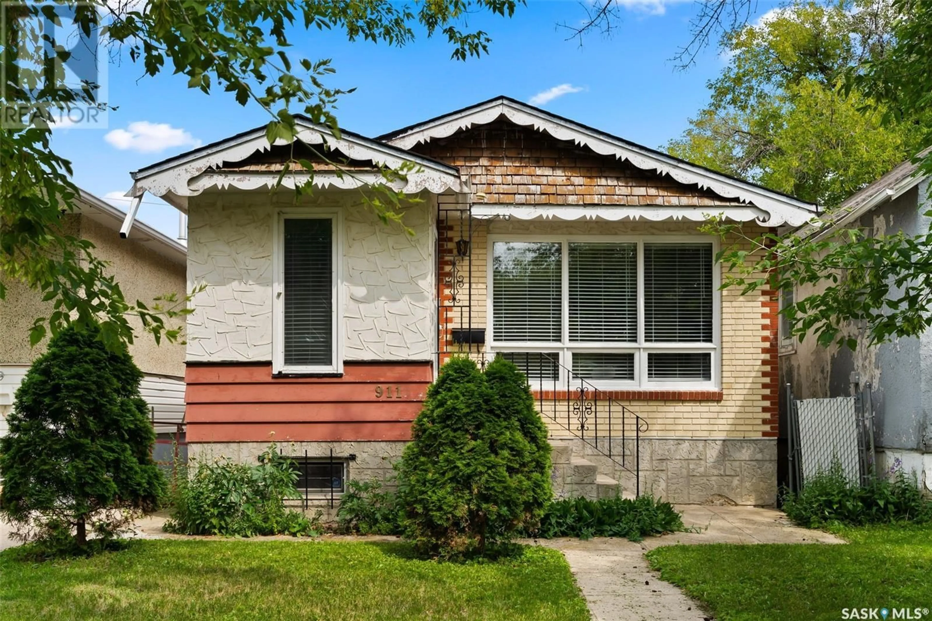 Frontside or backside of a home for 911 Cameron STREET, Regina Saskatchewan S4T2S5