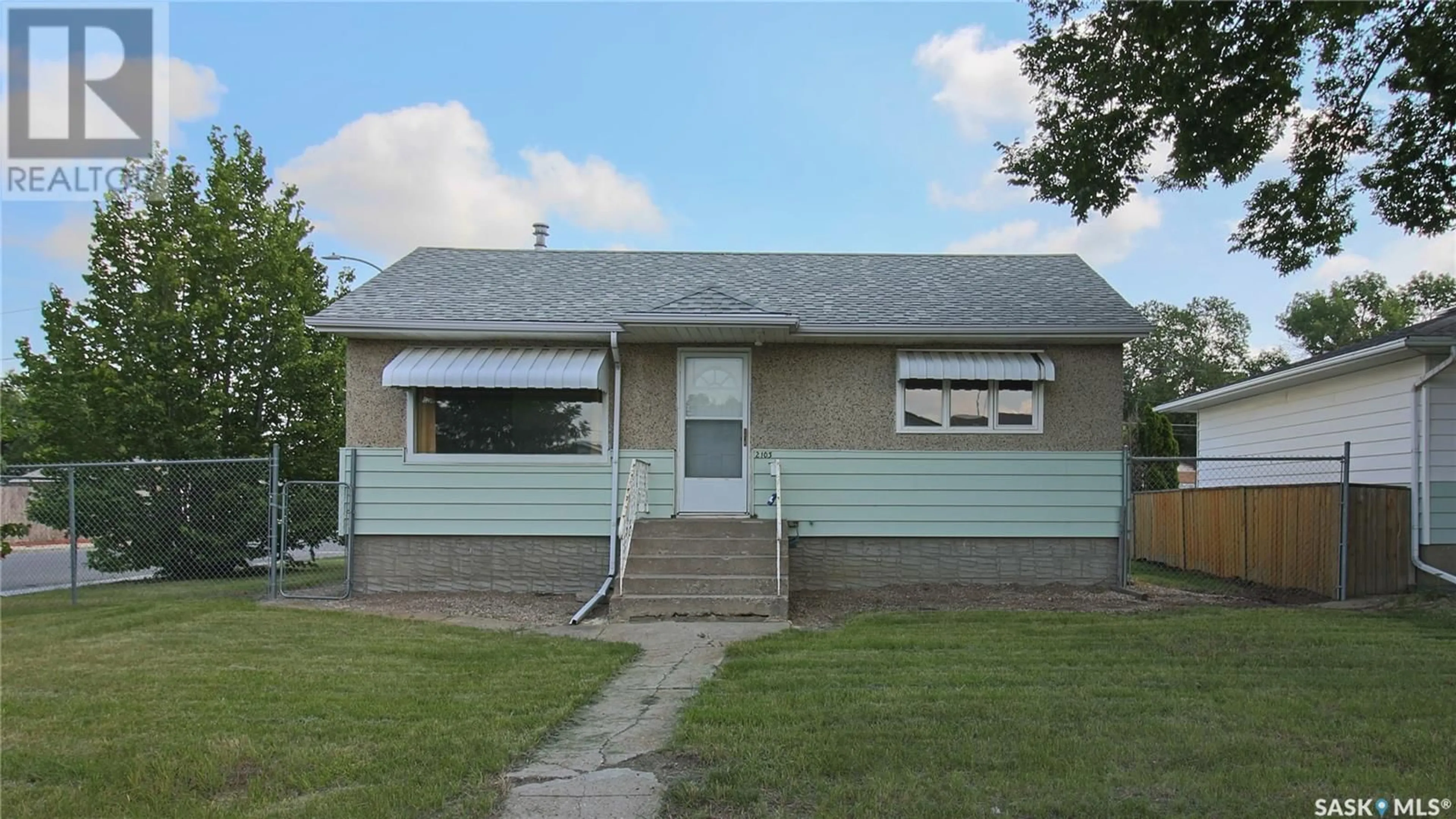 Frontside or backside of a home for 2103 Harvey STREET, Regina Saskatchewan S4N2M9