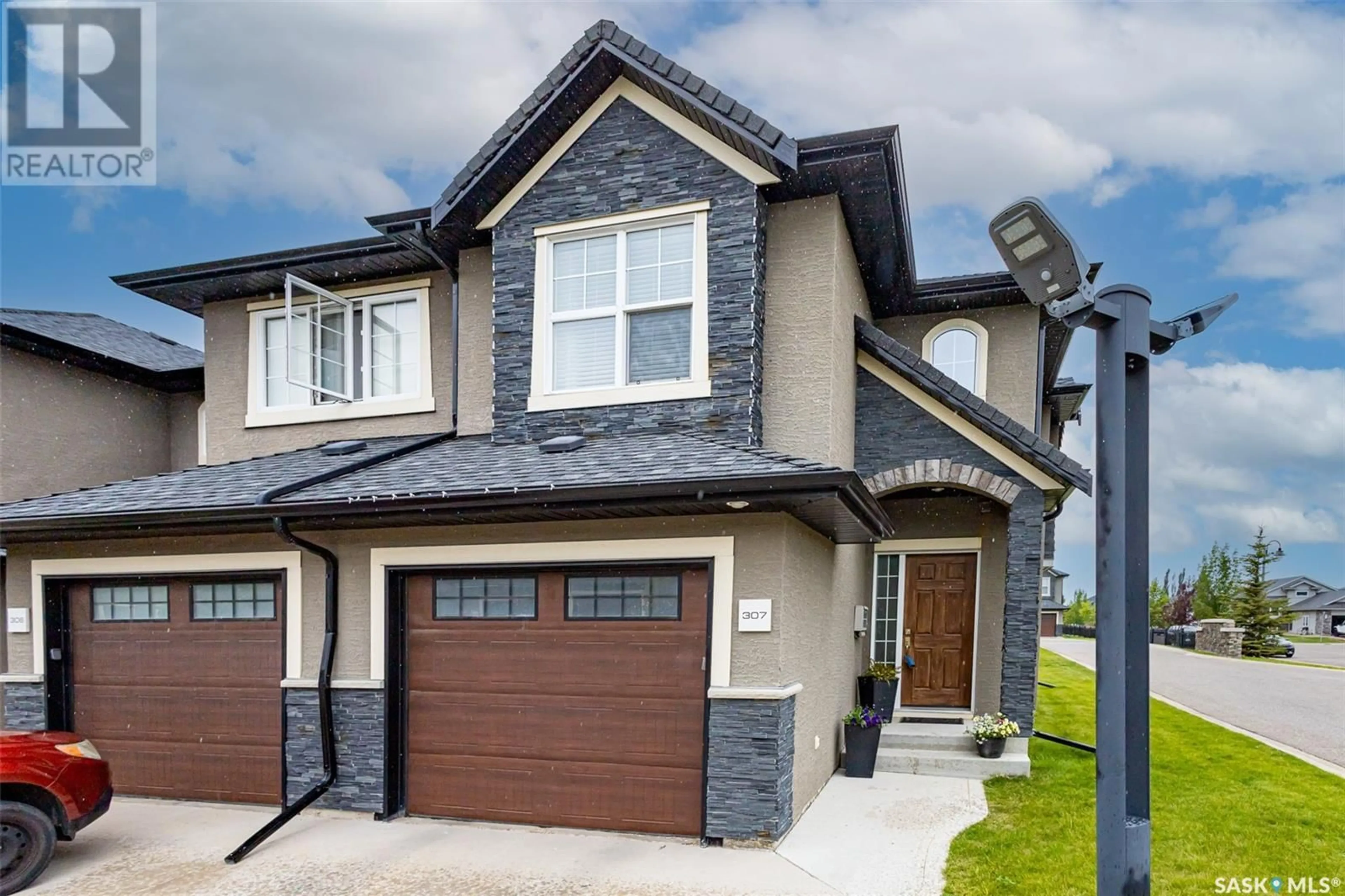 Home with brick exterior material for 307 455 Rempel LANE, Saskatoon Saskatchewan S7T0J3
