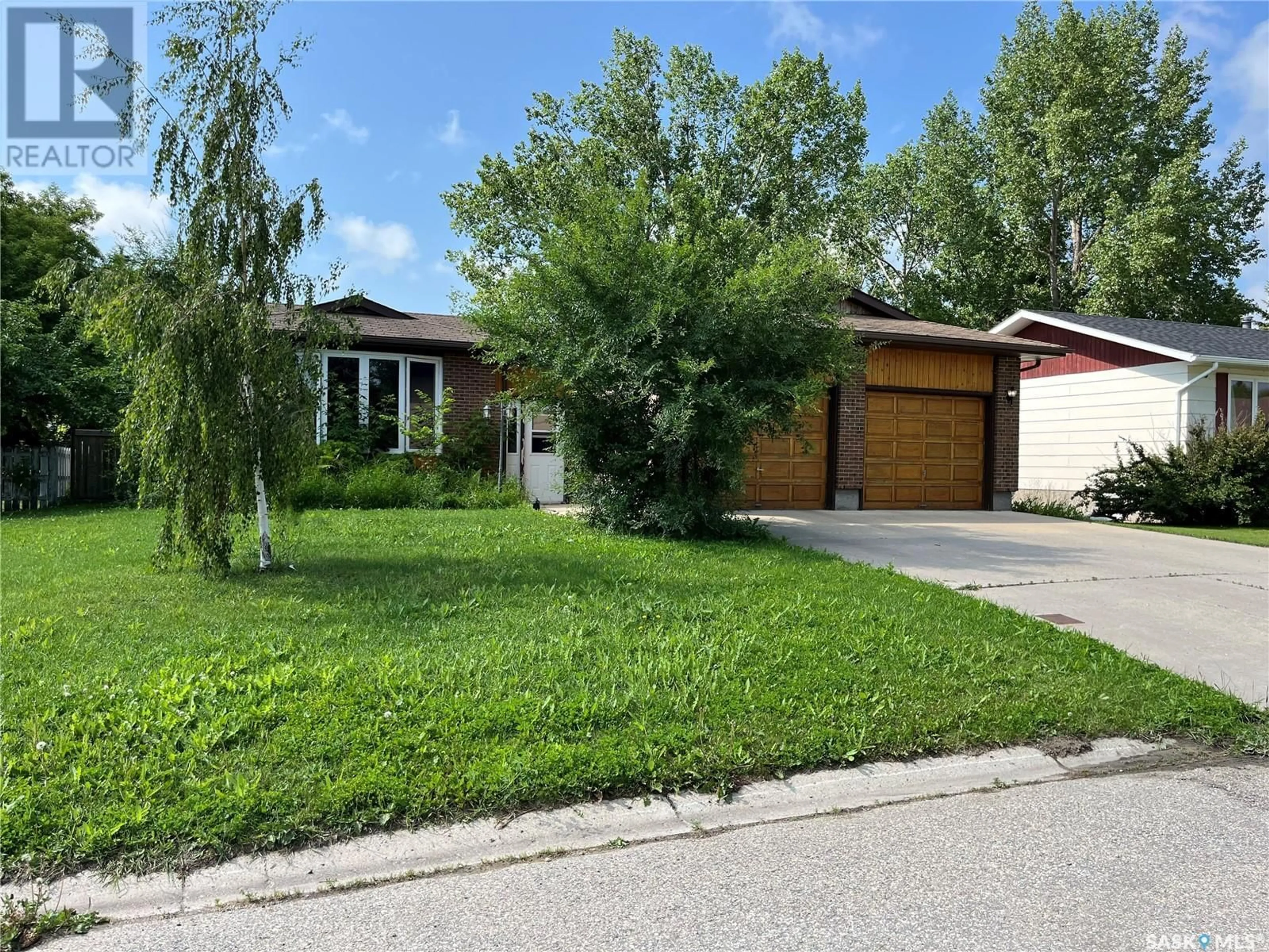 Home with brick exterior material, street for 221 4TH AVENUE, Whitewood Saskatchewan S0G5C0