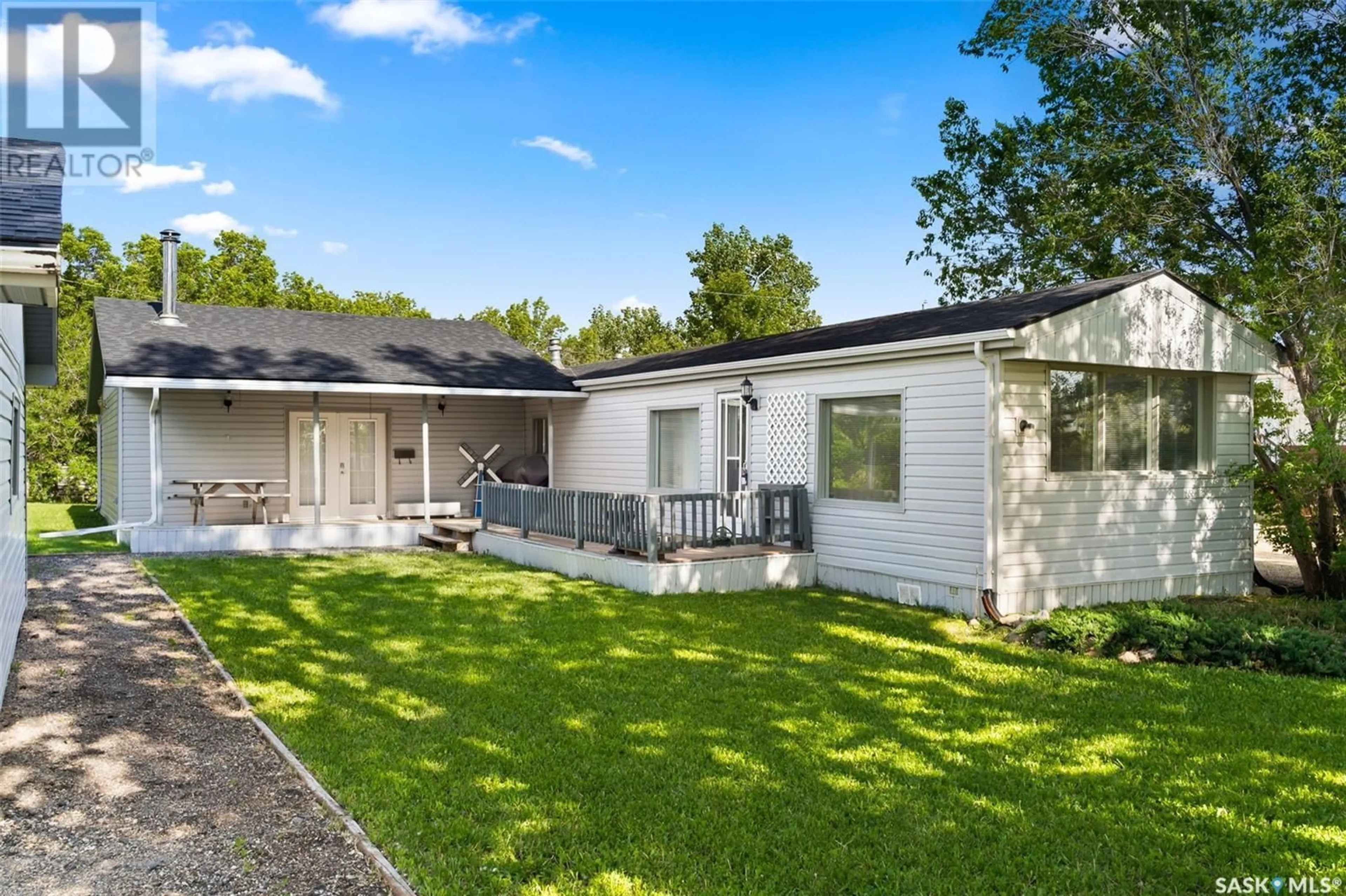 Frontside or backside of a home, the fenced backyard for 110 Wetmore STREET N, Rouleau Saskatchewan S0G4H0